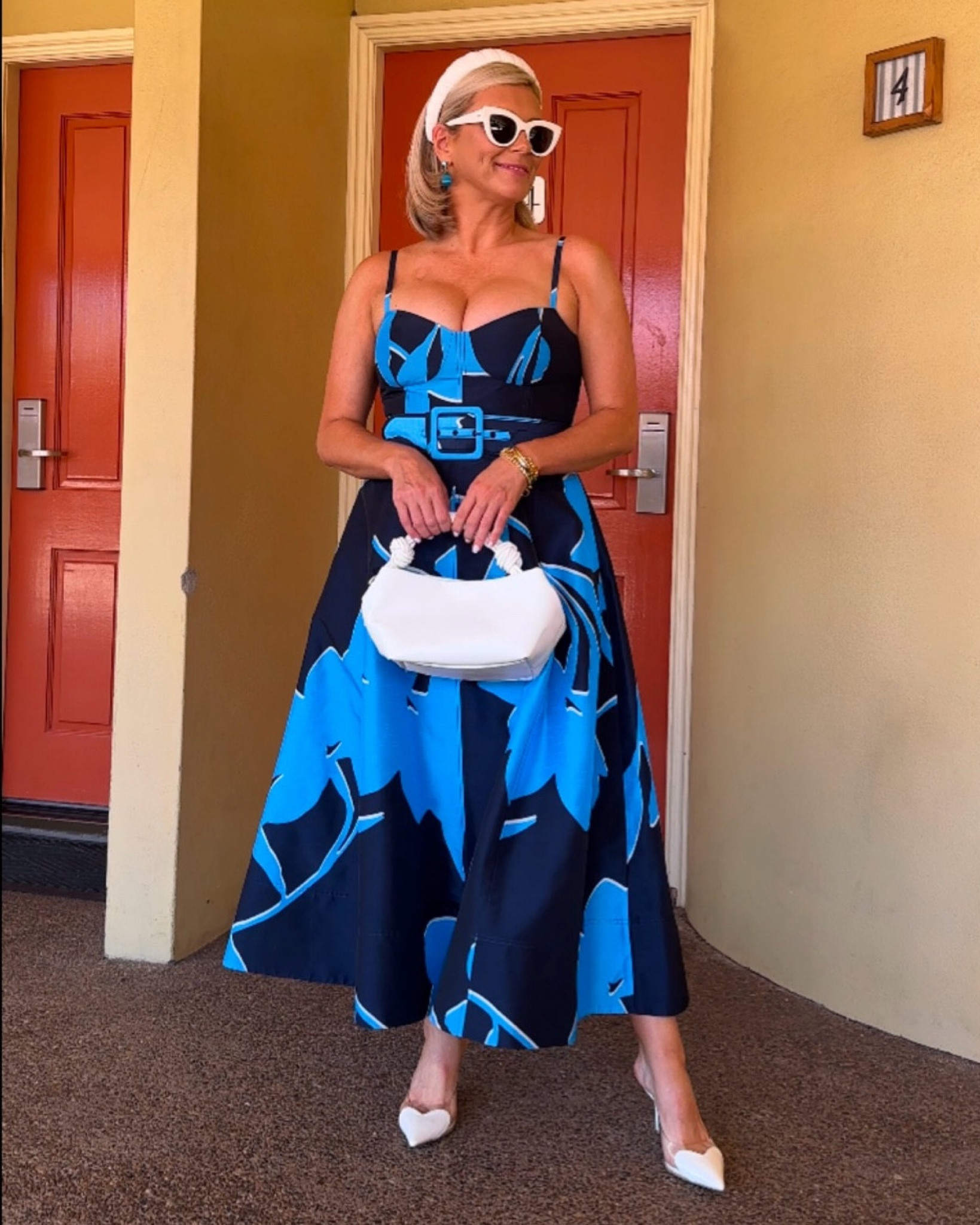 A stunning fit and flare style midi dress with a stunning vibrant blue hue printed design, tailored from taffeta. 
I love how it cinches at the waist and the circular skirt creates a beautiful silhouette. 

It looks beautiful paired with darker navy accessories, however I opted for white to tie into the colour on the print and lighten the look as it was for a daytime event  

I’m wearing a size 12. 

#LTKaustralia #LTKpartywear #LTKwedding