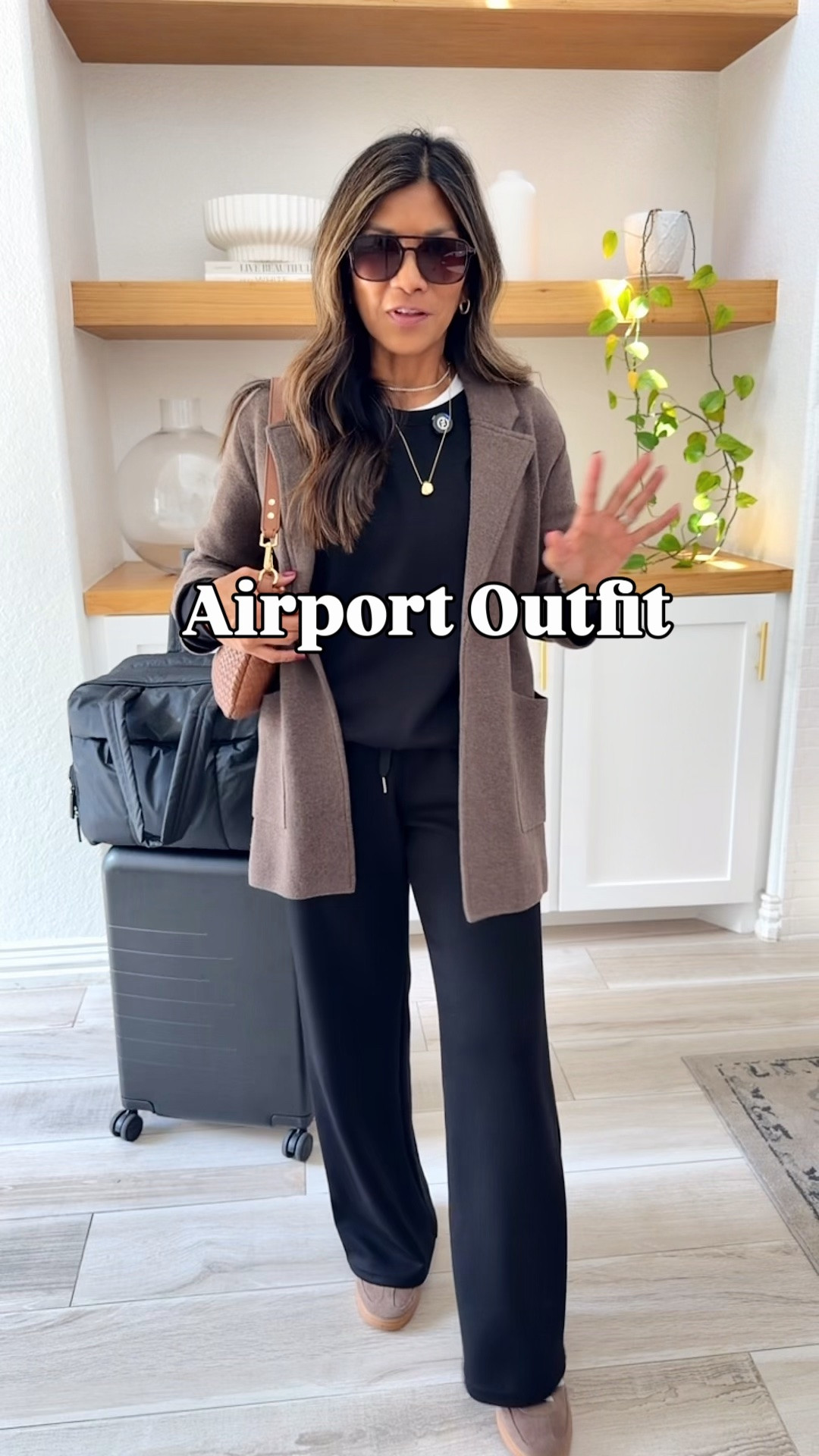 I’m 5’2” 118#ish for reference 
Airport Outfit for an overnight flight to Europe. Going to Puglia, Italy and Istanbul Turkey. 

 Black set in XS tts(I have to fold waistband cuz a little too long on me); 
Blazer  jacket in small, 
Adidas sneakers size down, 
White tee in small tts.
Woven leather bag is the small size. 
Carry-on expandable luggage is the regular size.
Black airport personal  bag is linked.


Travel outfit, airport outfit, Italy outfit, Europe outfit, versatile jacket, Amazon finds, over 50 style, midlife fashion, petite fashion,midlife women, affordable fashion, fashion over40

#LTKOver40 #LTKPetite #LTKTravel