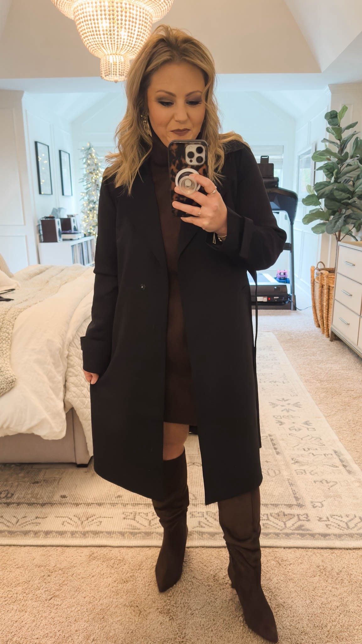 This lightweight trench coat is the perfect weight for fall! It can be dressed up or dressed down, depending on your outfit. I’ve worn it multiple times already and it’s currently available in several different colors. I’m wearing it here over a brown sweater mini dress and brown suede boots. The style is so classic and will be a wardrobe staple for years! fall coat fall wardrobe fall outfit date night outfit work outfit 

#LTKSeasonal #LTKGiftGuide #LTKWorkwear