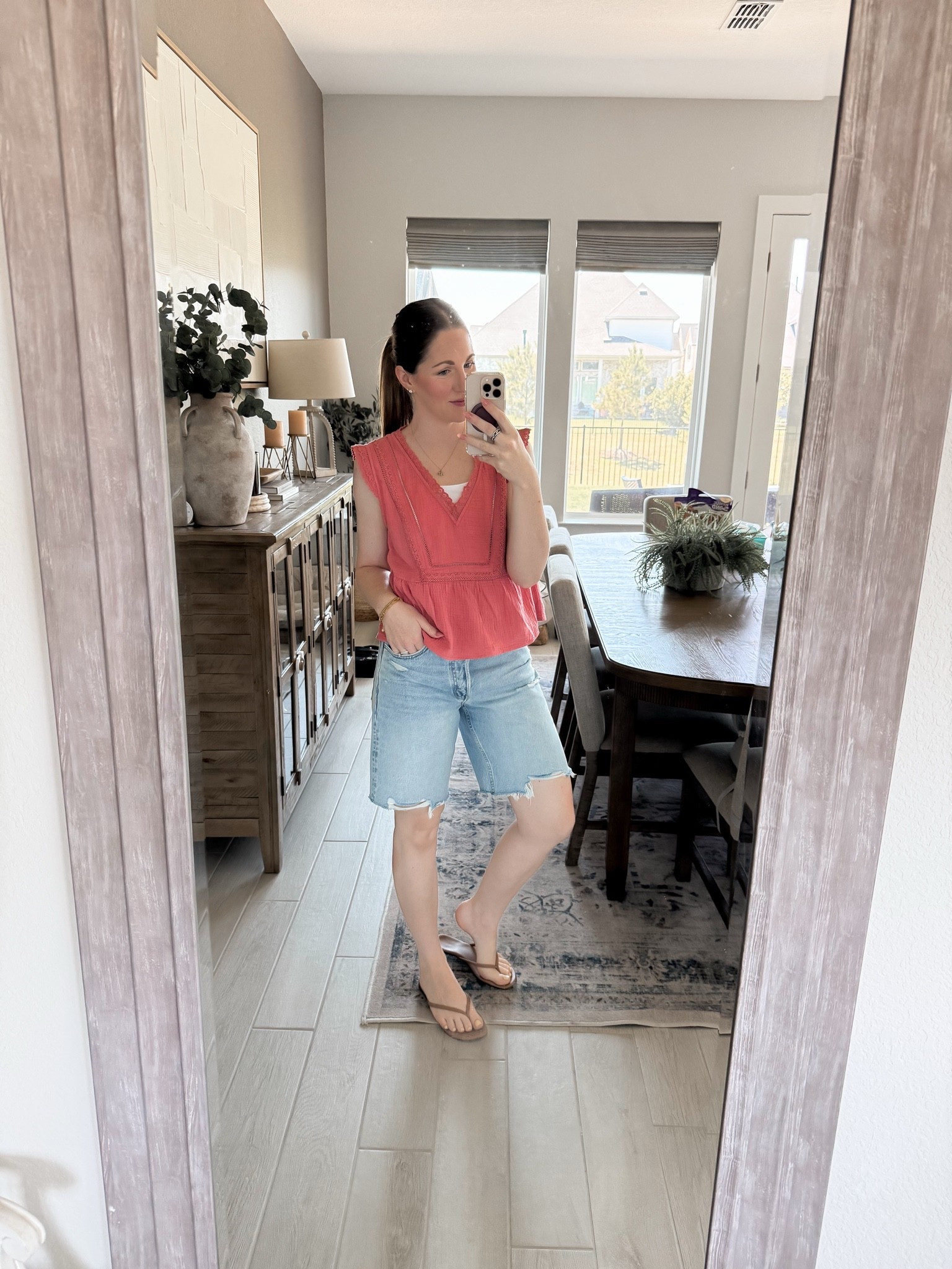 Coral tops, cutoffs, and easy summer days. ☀️ This embroidered blouse is one of those throw-on pieces that instantly makes you feel put together—lightweight, flattering, and perfect for everything from school drop-off to weekend brunch. Paired with my favorite denim Bermuda shorts and simple sandals for an effortless warm-weather look.

#RewardStyle #LTKStyle #SummerOutfit #MomStyle #CasualChic #BermudaShorts #EverydayOutfit #SummerFashion #OOTD #WeekendStyle