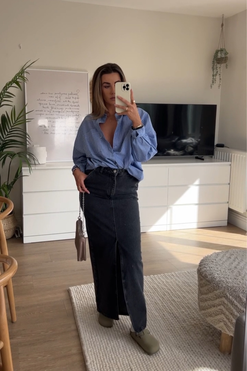 Styling a simple everyday outfit wearing birkenstock bostons with dark faded black denim maxi skirt and striped blue shirt - so good for spring! 🌿 

#LTKstyletip #LTKunder100 #LTKeurope