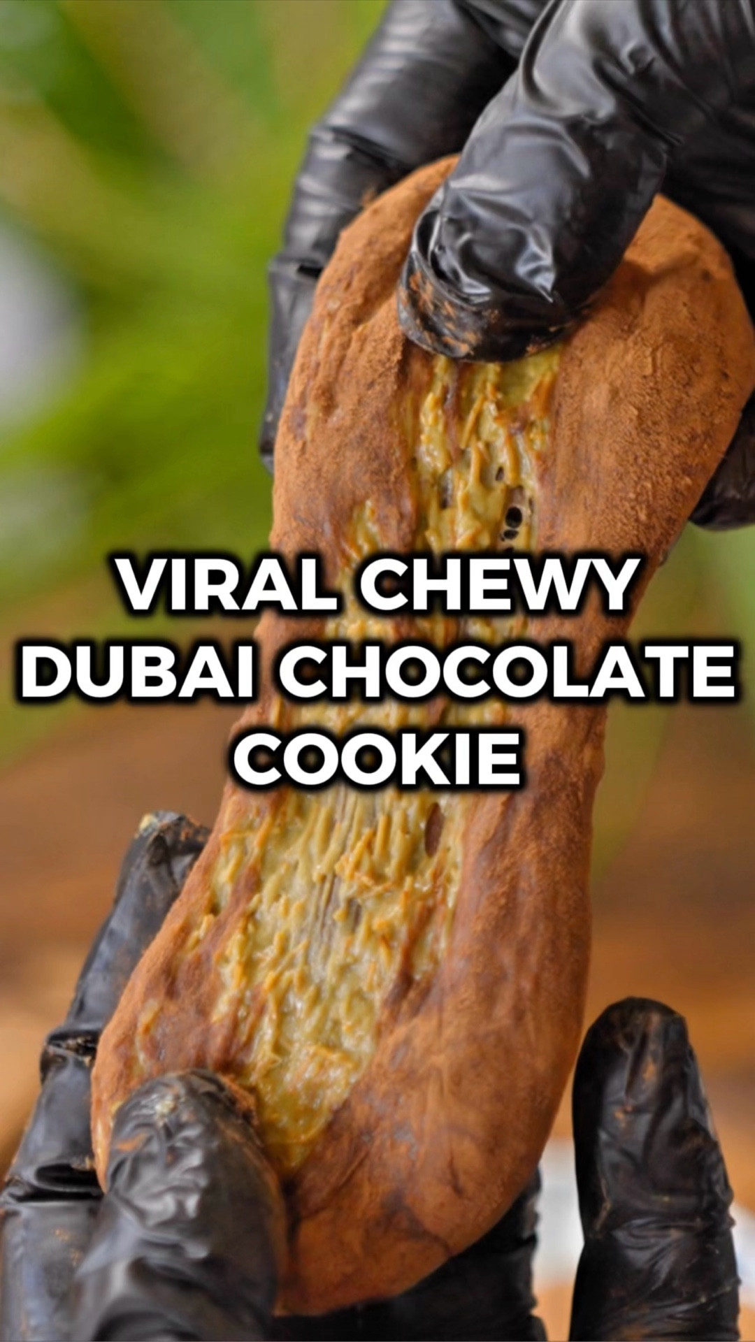 Ok guys, I’m starting my very first series! I’ve always taken inspiration from all the amazing home cooks I see on the interwebz, but up until now, I’ve really just shared recipes that I’ve tried, vetted, and enjoy. But some of these viral recipes look really cool, even if I haven’t tasted them, so I figured this would be a cool way to take you all along on my journey of experimenting and seeing if these viral recipes are actually worth making. So let’s get to it!

The flavor of the Chewy Dubai Chocolate Cookie was delicious and sort of as you’d expect, but I have to admit, it loses some points from the texture.

If you’re a millennial like me, you probably grew up a Nickelodeon kid, and if you ever had Gak (that slime stuff) that’s what the marshmallow dough reminded me of lol. It slowly oozes through the gaps in your fingers, and it’s not the most pleasant experience.

Overall, if you like Dubai Chocolate, you’ll probably enjoy this! I’d give it an 8/10.

Would you try it? Let me know in the comments what you think if you do! 🙌

INGREDIENTS:
5 oz pistachio cream
1/3 cup toasted kataifi
2 tbsp butter
5 oz marshmallows
2 tbsp cocoa powder
1 tbsp powdered milk
2 tbsp cocoa powder (dusting)

INSTRUCTIONS
1️⃣ Mix the pistachio cream and toasted kataifi in a bowl Place it in the fridge while you make the dough. Add the cocoa powder and powdered milk in a separate bowl and whisk to combine.
2️⃣ Melt butter to a frying pan over low heat and add the marshmallows. Stir continuously until they’re about half melted.
3️⃣ Sift the cocoa powder mix onto the marshmallows. Stir and fold it together until you get a solid dark brown blob. Transfer it to parchment paper and let it cool for a couple minutes.
4️⃣ Tear it into 4 pieces. For each one, press it into a disk in your hand, and spoon a quarter of the pistachio cream mixture into the middle. Wrap it around the mixture and roll it into a ball between your hands.
5️⃣ Add cocoa powder to another bowl and roll the balls in it to coat them completely.
6️⃣ Enjoy!

#LTKfoodie