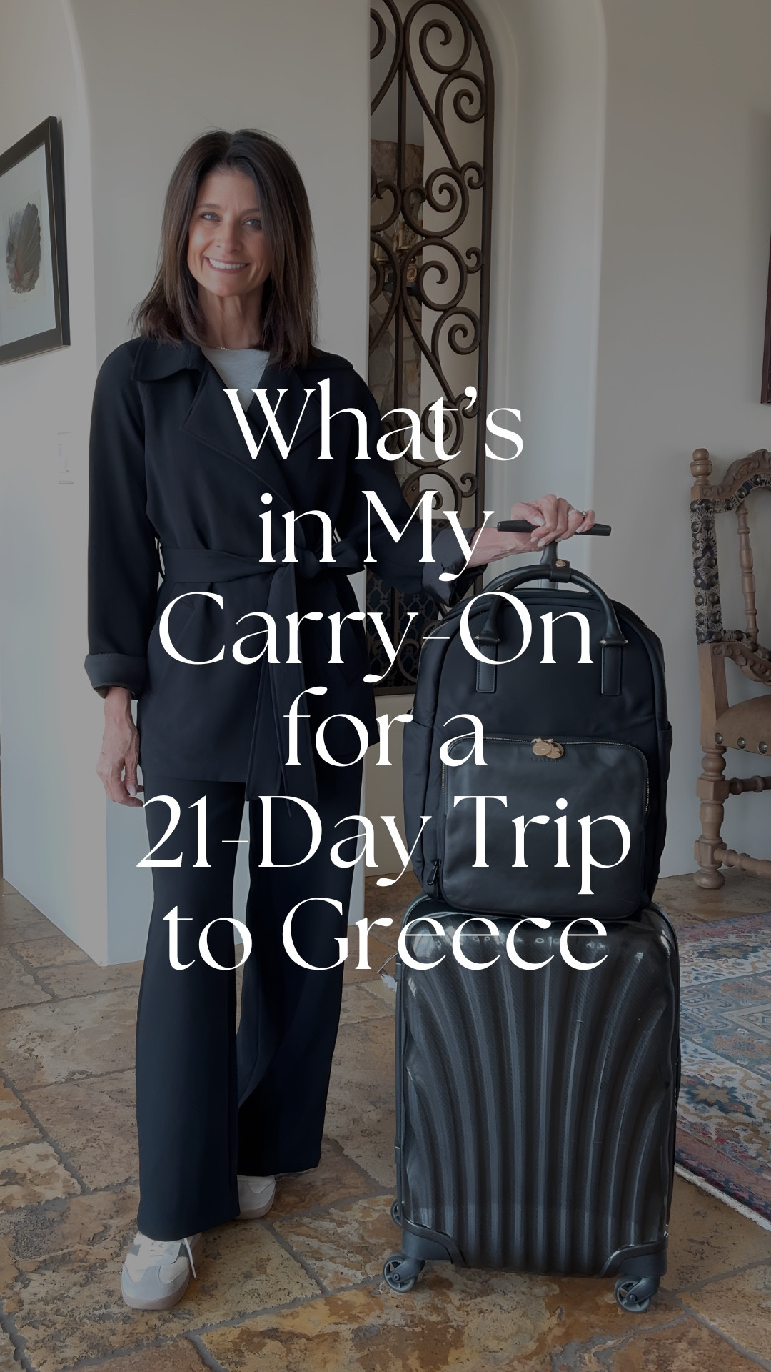 What's in my Carry-On

“I’m packing for 21 days in Greece — an early spring road trip through ancient ruins, medieval villages, and mountain monasteries, with a stop in Santorini including a full day on a catamaran. Cooler temperatures, long drives, and a few really special dinners. Here’s exactly what’s in my bag.

Six tops. 
Three bottoms — plus a pair of lightweight joggers for the catamaran day. 
Two dresses for the days I want to feel a little more elevated or for nicer dinners. 
Two pairs of shoes: a walking sneaker that handles everything, and a black mary jane flat for evenings.
Four outer layers in different weights — a packable down jacket, a black cardigan, a black wrap trench for dinners, and a rain layer. 
Plus the obvious: one bathing suit, underwear, pajamas.

Last minute I threw in a pair of pool sandals — and I swapped that black raincoat with my cream one because it was too heavy for this trip.

One carry-on, twenty-one days!
