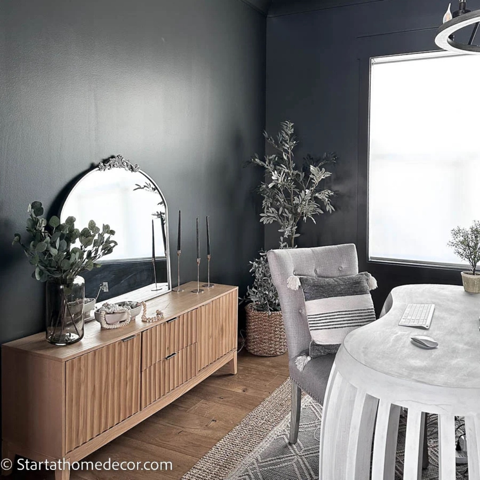 Office decor. Silver mirror. Oak credenza. Olive tree. Scalloped furniture. 

#LTKhome #LTKunder50