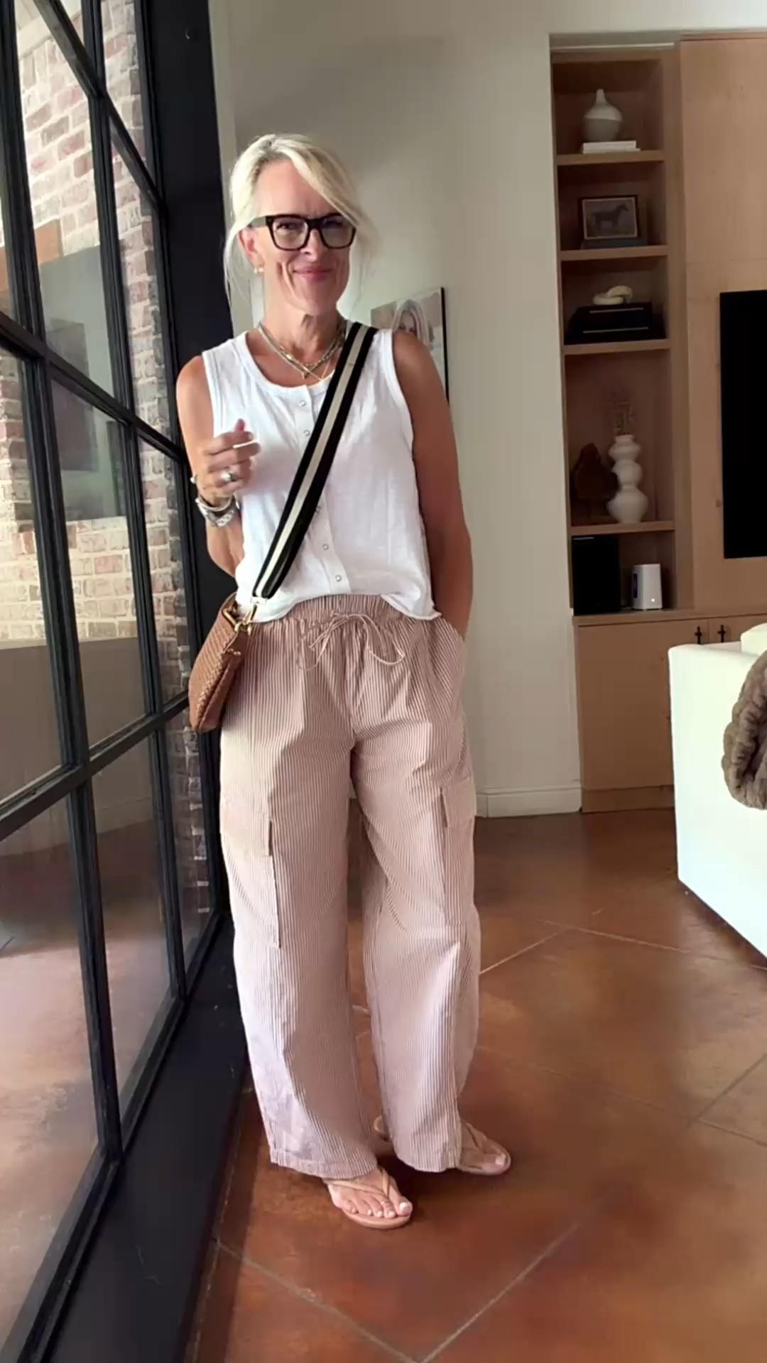 These striped cargo pants are such an easy everyday find. I love the soft cotton blend, comfortable elastic drawstring waist, and relaxed barrel-leg shape. The subtle stripe adds interest without being difficult to style, I’d wear them with a simple tank like this, a tee, or a sweater when the weather cools down.

💡 LTK MADE EASY
❤️ Heart = Support my posts!
🔖 Save = Get sale & restock alerts
📋 Lists = Keep favorites organized
📲 Share = Send lists and products to a friend. Hello, Christmas List!
💬 Comment = Ask me anything about what I’m wearing.:-)

#LTKootd #LTKOver40
