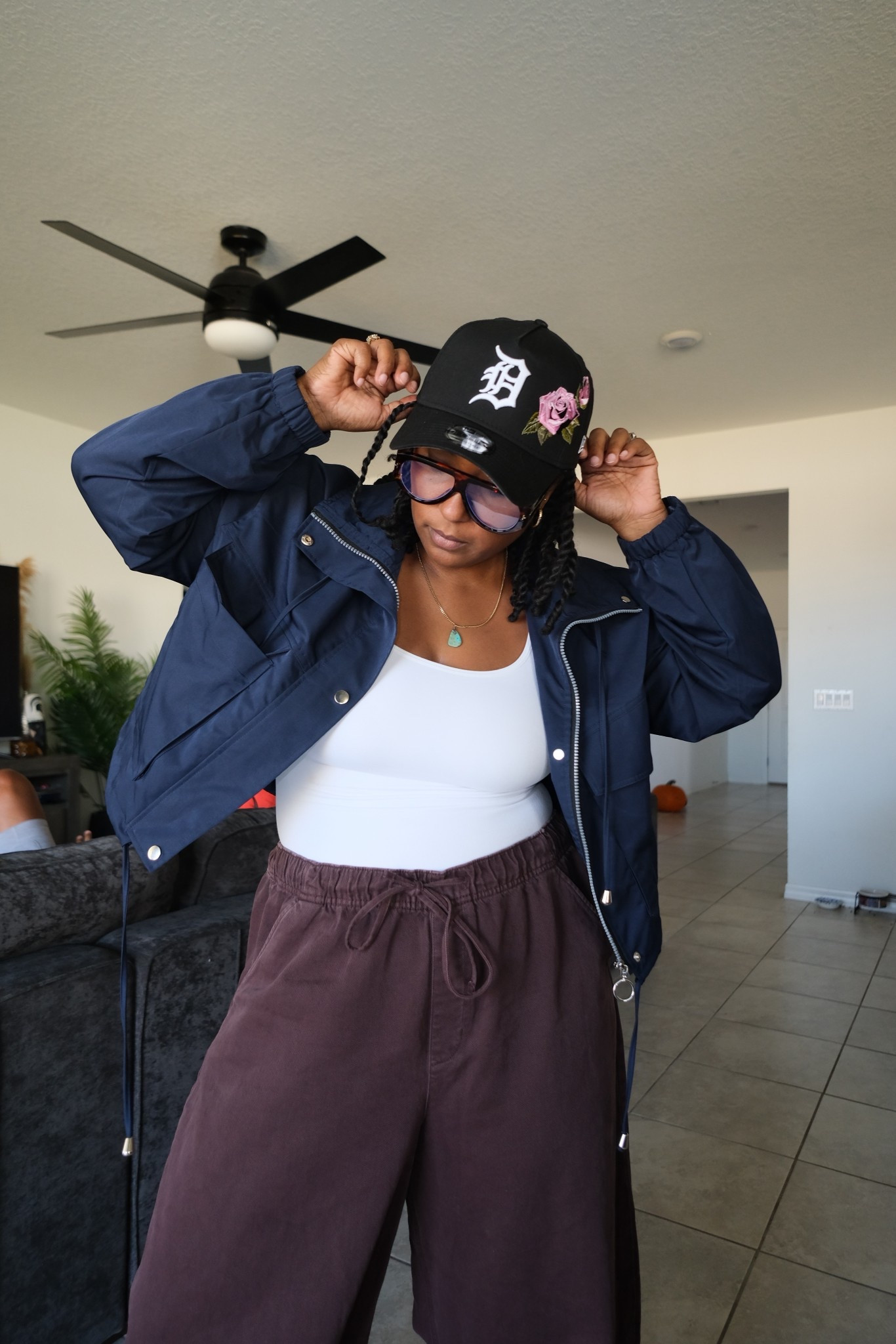 Tummy control tank top. 
Cropped nylon jacket. 
GAP horseshoe pants 

#LTKOver40 #LTKStyleTip