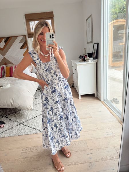 Blue and white smocked maxi dress. Comes in green too  

#LTKSeasonal #LTKStyleTip