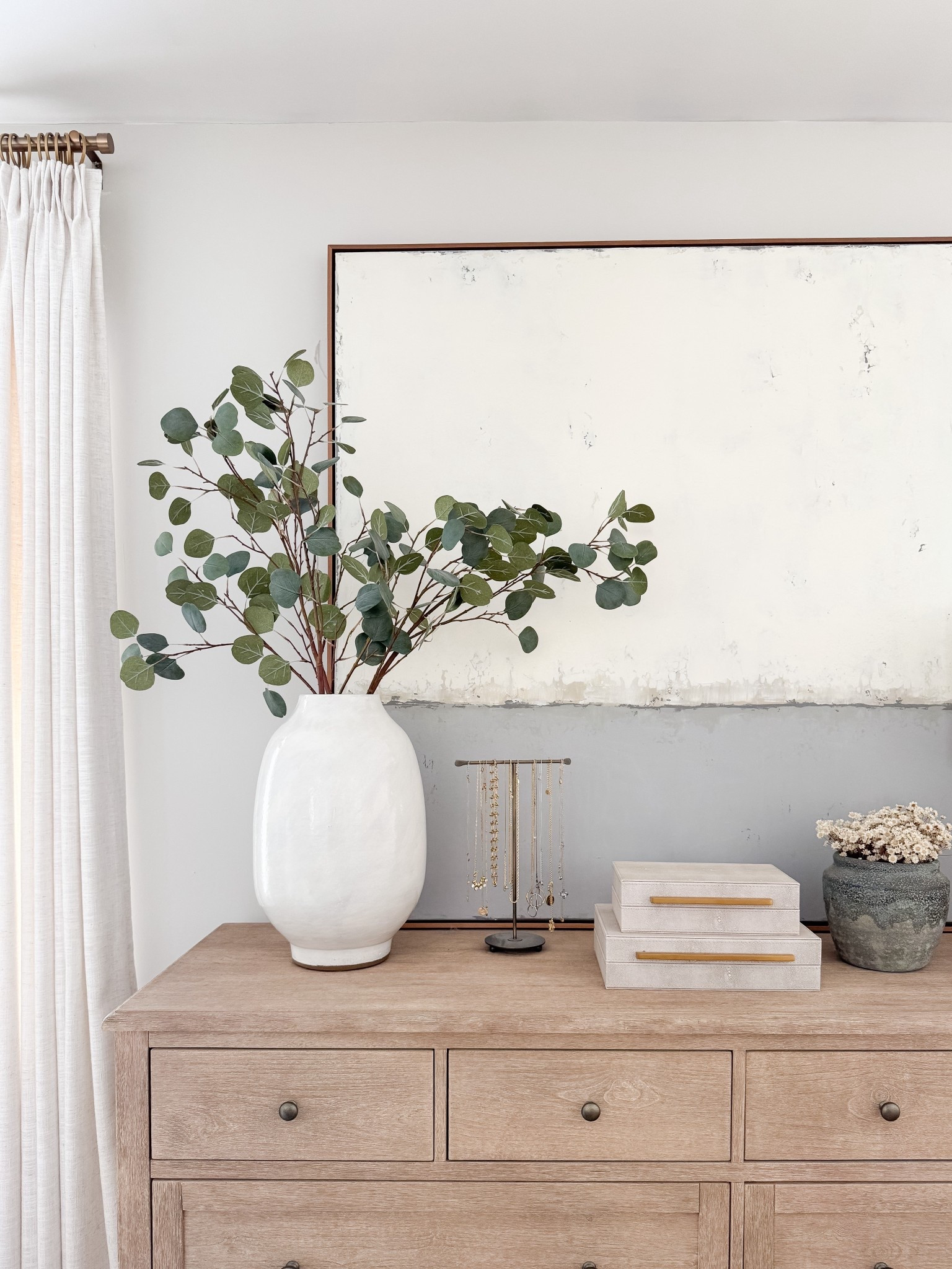 Light wood furniture styled with ceramics and greenery brings warmth and balance to the bedroom. coastal bedroom furniture, wood dresser styling, neutral home decor, coastal interiors, bedroom styling ideas, timeless bedroom, natural textures, home inspiration, sherricalnanhome

#LTKHome