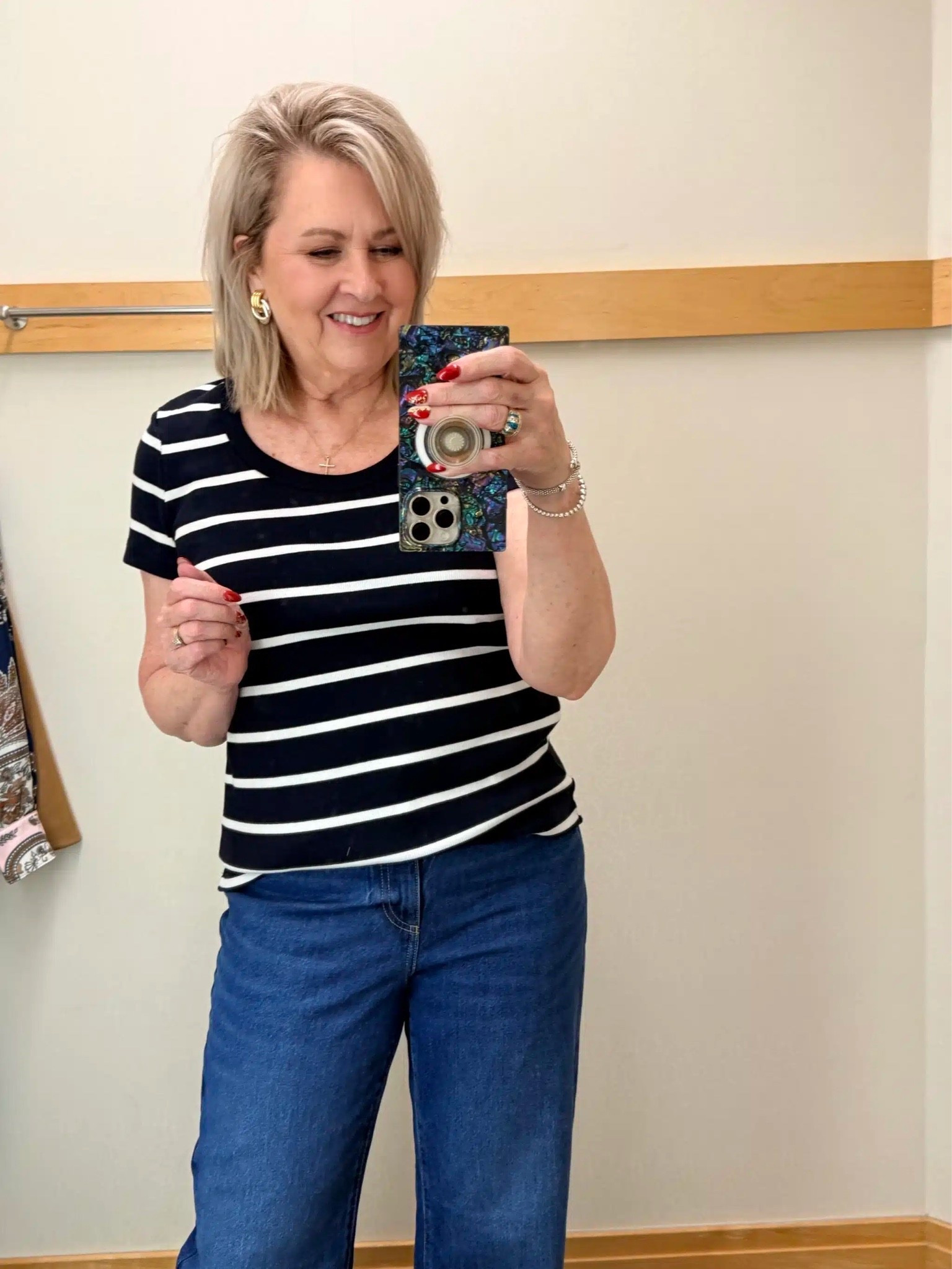 A great basic tee to have in your closet! I am wearing a size large. It comes in another color way and is 25% off today.

#LTKOver40 #LTKSaleAlert #LTKootd