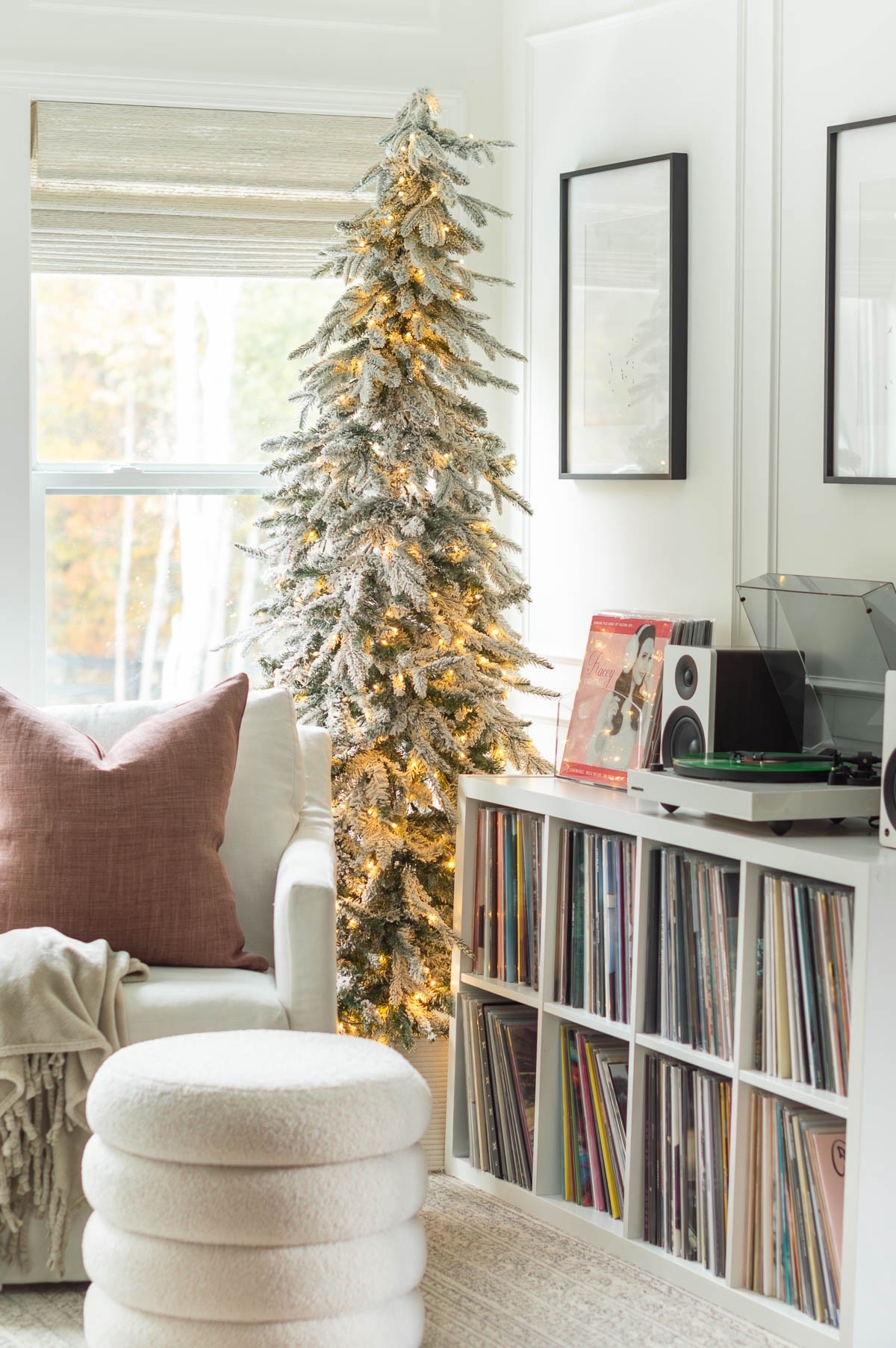 A pre-lit slim flocked Christmas tree adds just the right touch in the listening nook of my bedroom and no ornaments are required. It’s also the perfect night light in the evening. home decor bedroom decor sitting room area reading nook neutral bedroom boucle storage ottoman vinyl storage 

#LTKSeasonal #LTKHome #LTKHoliday