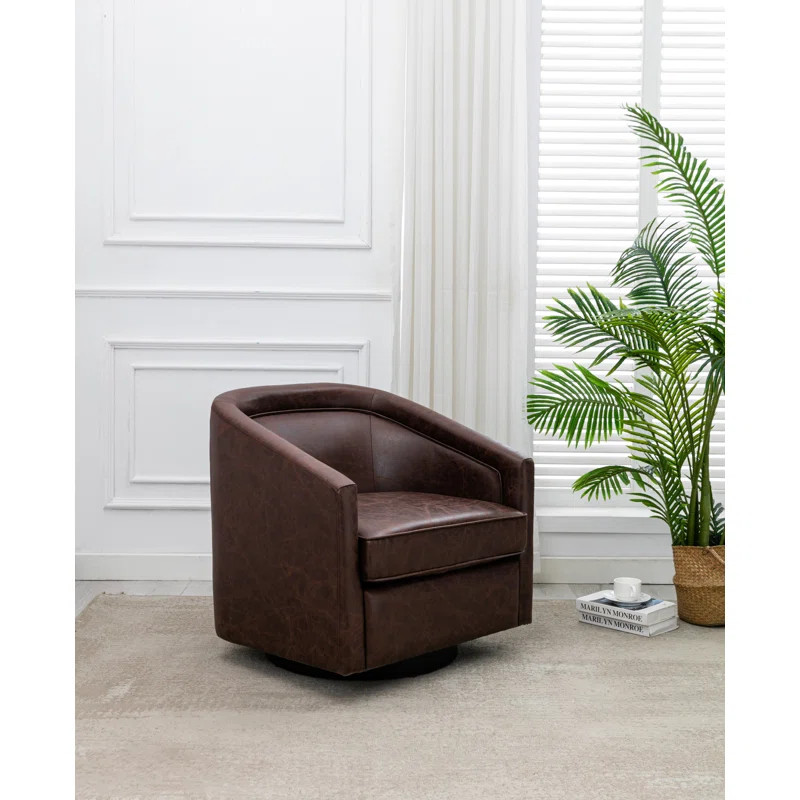 Kiersten Faux Leather Swivel Barrel Chair | Wayfair North America