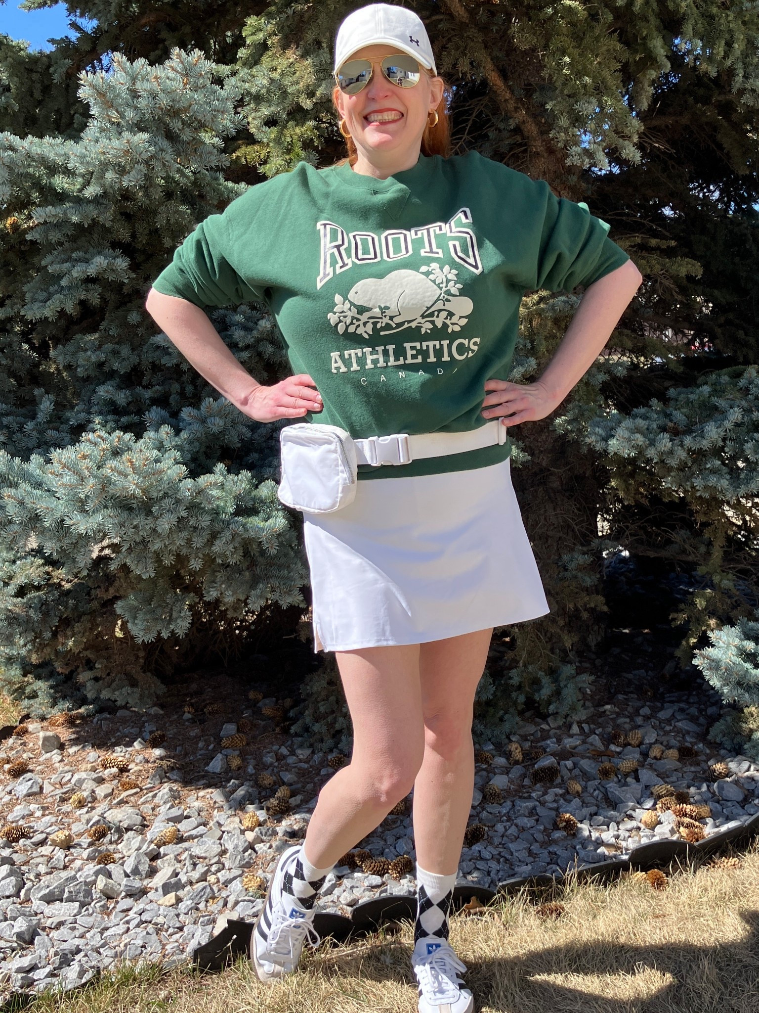 Snow - don’t stop me now because I’m having a good time showing some leg! I forgot I had this cute athletic skort but as soon as I found it, I knew I needed to style it. So I grabbed my vintage Roots sweatshirt, a cap, some aviator sunnies, bum bag, argyle socks, and fav sneakers to complete the look. Yes there is supposed to be snow later this week but I’m pretending there is not going to be any. Canadians click on the first links to shop, and Americans click on the second links to shop. If there’s only one link then you can shop it in your own country. And remember, trendy doesn’t have to be expensive! Bye!

#LTKOver40 #LTKootd #LTKActive
