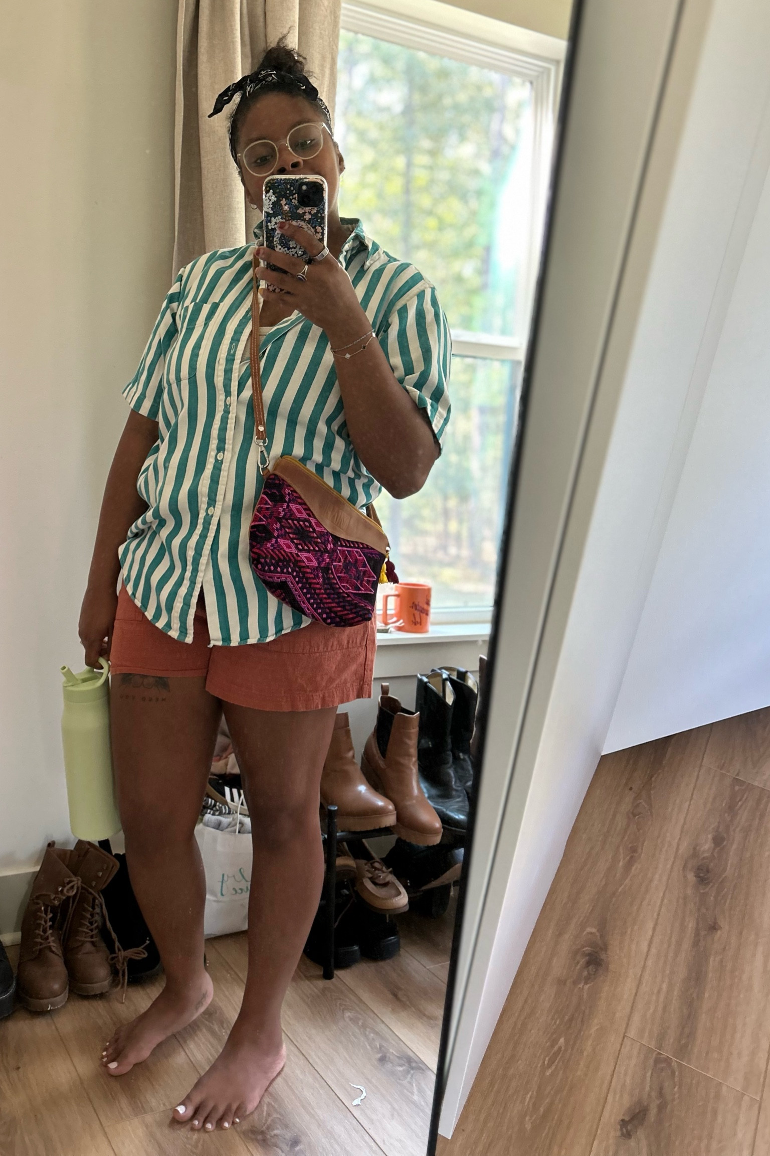 "Who says stripes and prints don’t go together? 🙃 Mixing and matching patterns is my love language, especially when the South is holding onto summer like it’s got a prize to win. ☀️🍂 

Transitioning to fall when it’s still 90 degrees means shorts stay in the rotation, but I’m bringing in those fall vibes one layer at a time! Here’s to hoping for sweater weather soon... but until then, it’s breezy tops, bold prints, and keeping cool! 😅 

What’s your go-to when summer and fall can’t decide who’s in charge? 

#SouthernFall #PatternPlay"

#LTKMidsize #LTKSeasonal