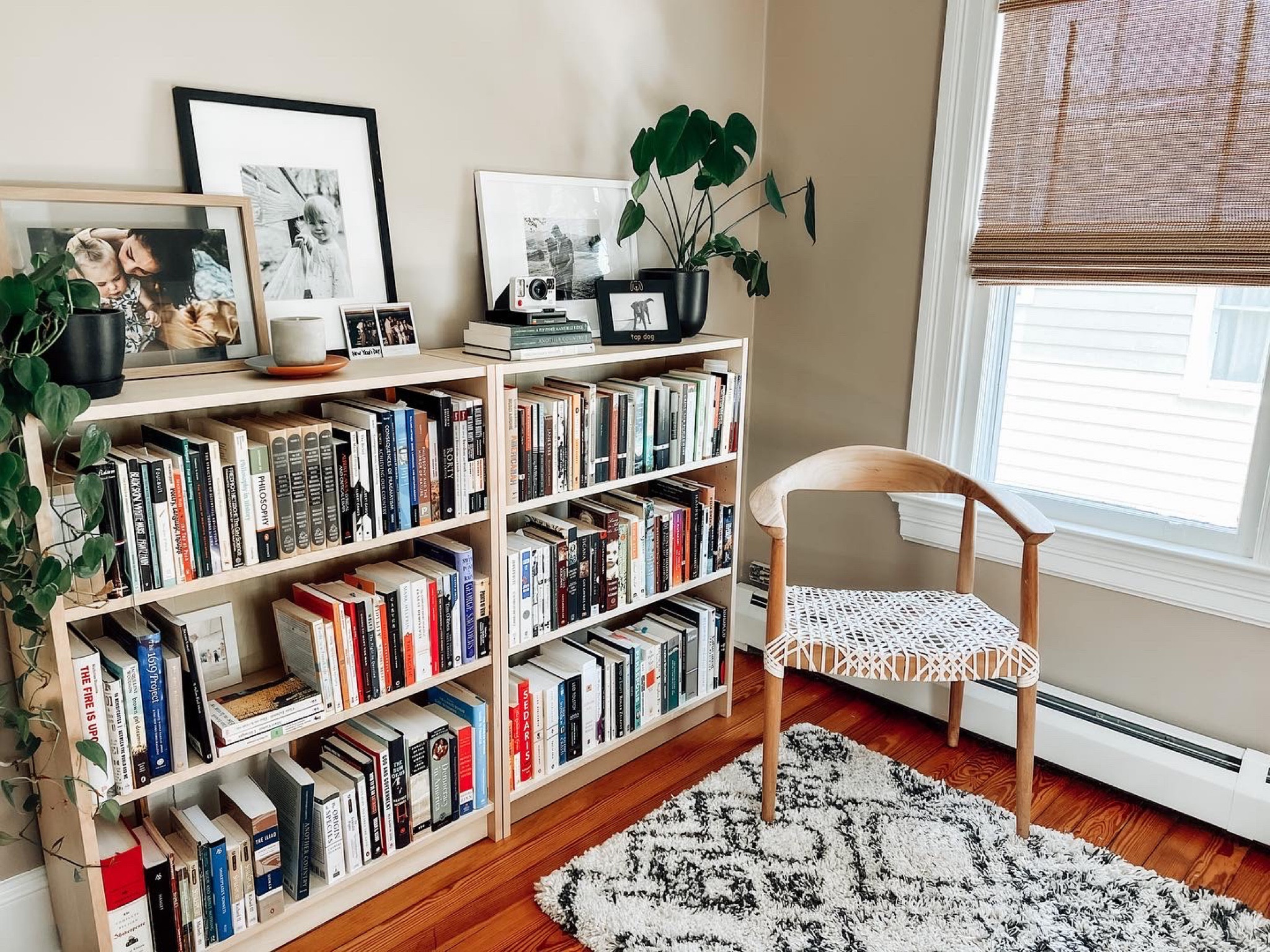 Minimalist boho office nook with some great last-minute gifts: plants! Philodendrons are so easy for new plant parents. Practical shelf decor, including a Polaroid camera. Cozy area rug and picture frames   

#LTKGiftGuide #LTKhome #LTKHoliday