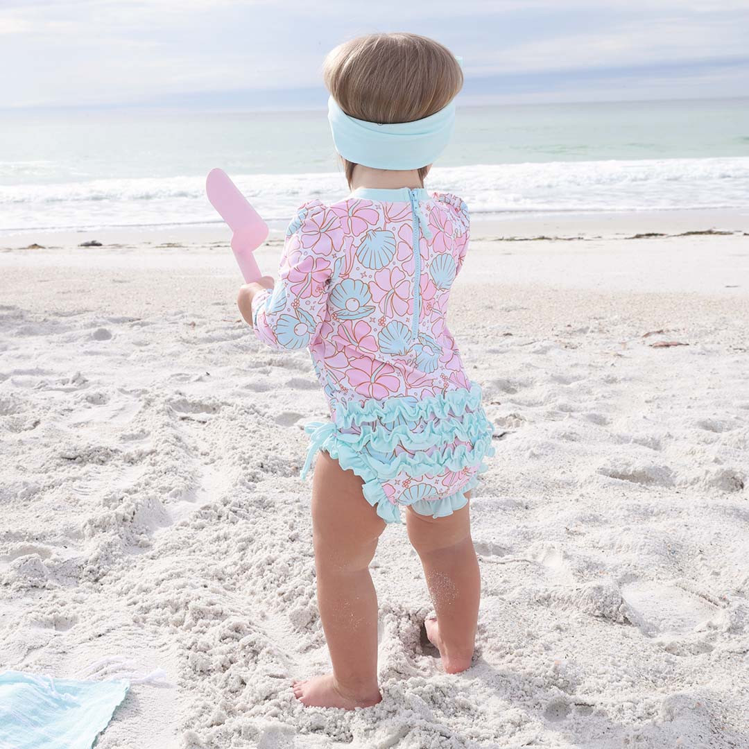 Long Sleeve Rash Guard With Ruffle Bottom | Ocean Pearl | Caden Lane