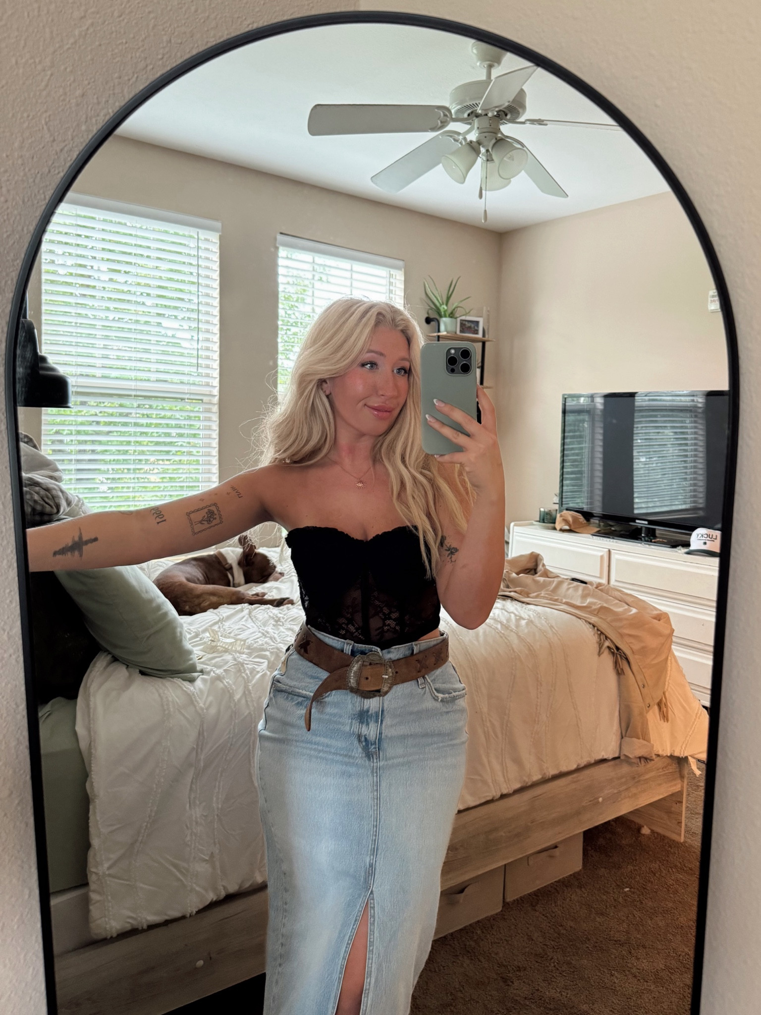 Country concert Nashville night out denim skirt outfit🖤 strapless corset top is size Medium, skirt is size 4, belt is thrifted but tagged similar ones below🔗

#LTKFindsUnder50 #LTKParties #LTKTravel