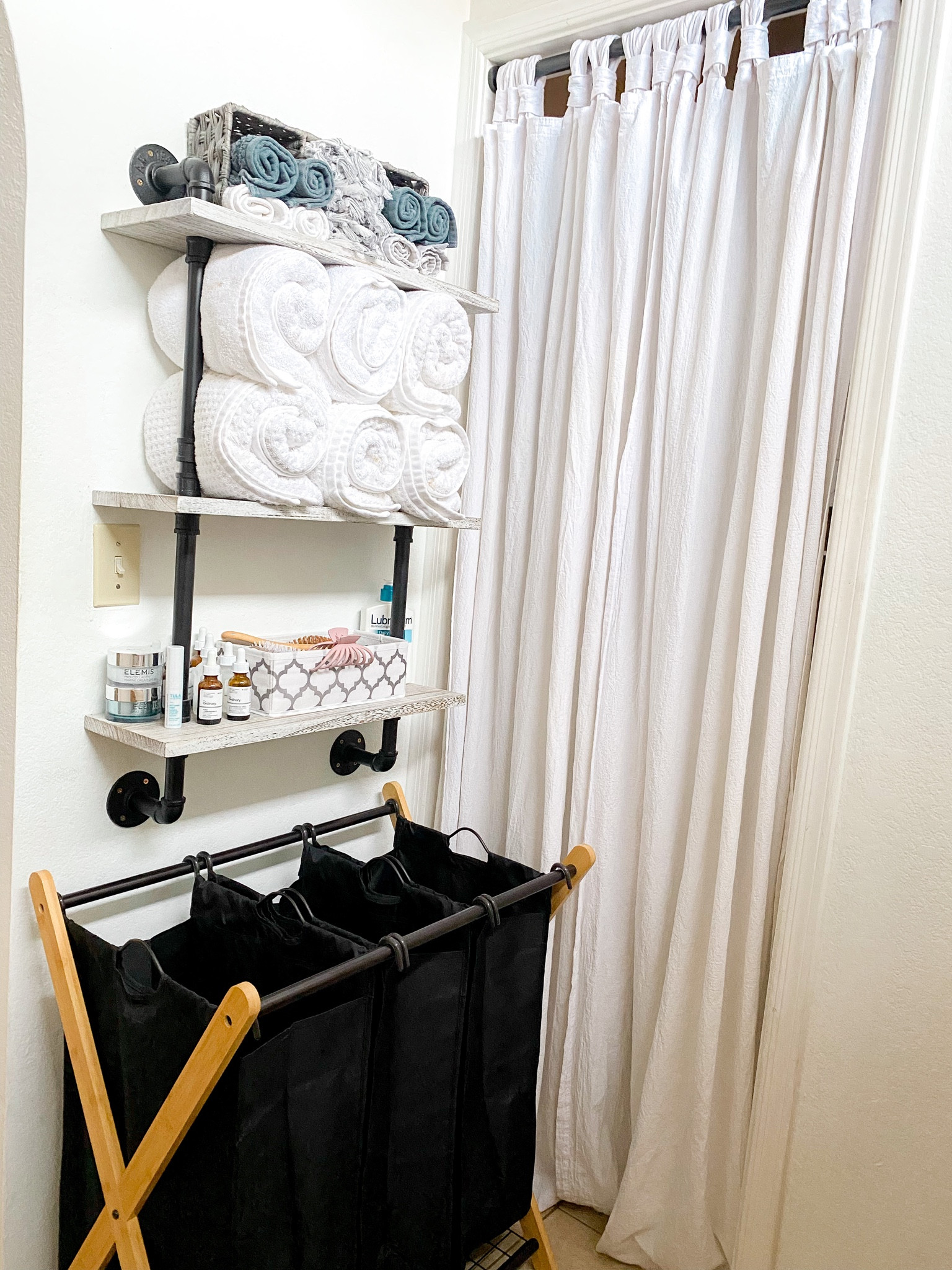New laundry basket; really wanted something that would make sorting a little more easy when the end of the week comes. This one is such high quality, I was very satisfied with our purchase. It is to big for our space here, but I’ll tolerate it sense I love it so much. 
Wall shelf has been holding up very well also, going on four months. Highly recommend the towel sets and that towel warmer as well, I love that thing. Linked up some extras, such as our linen curtains (they no longer have white) and that adjustable curtain rod is the best I’ve tried out so far! 

#founditonamazon #amazonfinds #bathroom #smallspace 

#LTKhome #LTKHoliday #LTKSeasonal