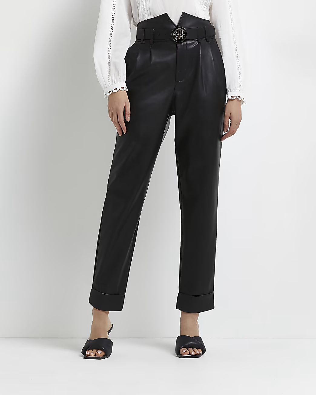 Black faux leather tapered trousers | River Island (UK & IE)