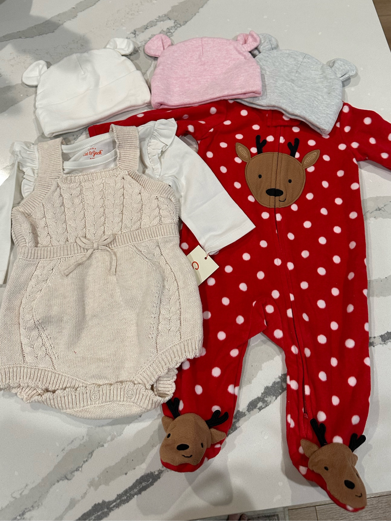 More adorable target baby outfits! Baby winter clothes. Baby beanie. Reindeer footie pjs. Baby footie pajamas. Baby Christmas. 

#LTKGiftGuide #LTKHoliday #LTKBaby