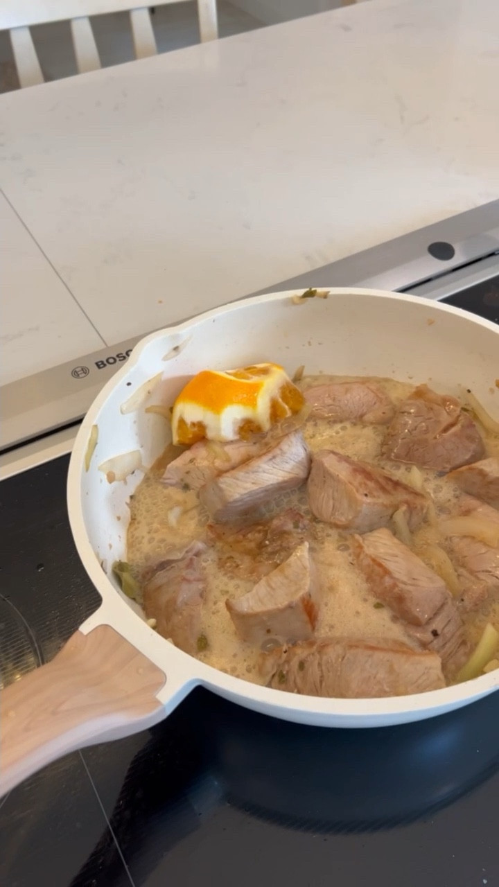 Coca-cola braised Carnitas bowl recipe

4-5 lb pork shoulder/pork butt
2 spoon of oil
1/2 cup of milk
1/2 cup Mexican Coca Cola or regular
1/2 orange
Cumin
1/2 head of garlic
6 bay leaves
1 tsp whole cloves
1/4 of mojo liquid to marinade. 
½ onion
½ cup water
1 tbsp salt
Pico de gallo salsa
Avocado/guacamole
Cilantro, chopped
Onion, chopped
Limes

Instructions
Place the pork in a pan and fried, add 1/2 onion then season with the salt and pepper. Cook all sides. Pour in the Mexican Coca-Cola, orange juice and leave the rest of the orange inside, milk, and mojo marinade then add allspice, garlic and bay leaf. Add 1/2 cup water to the pork, cook for 5 min put everything in the instant pot for 35 min after shred the meat.
In a bowl put rice, beans lettuce, poco de gallo salsa, pork, guacamole and cheese. 
