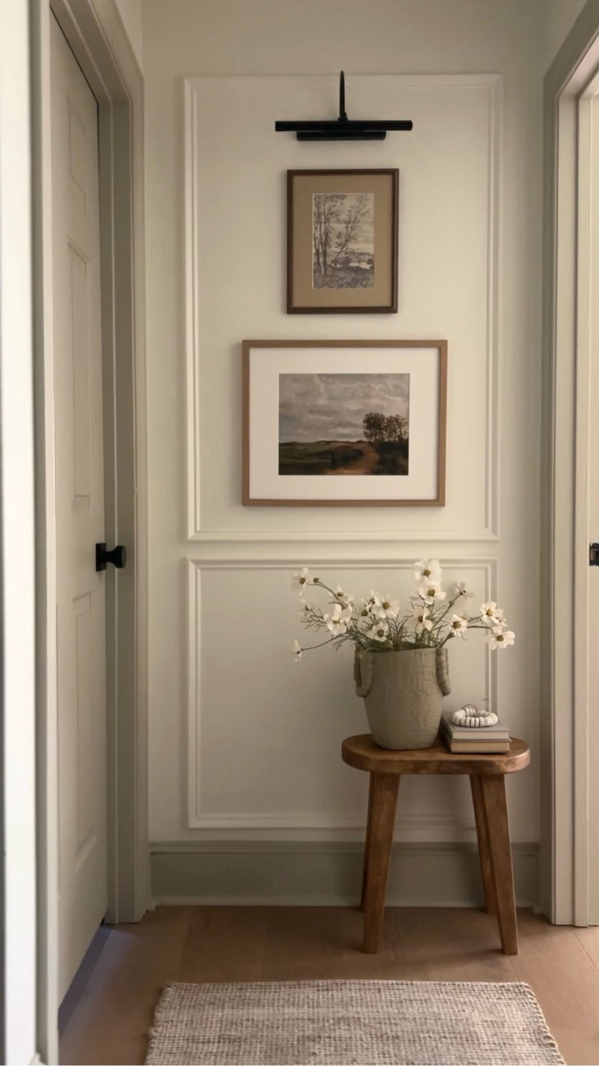 Hallway Views | hallway decor | stacked art | library light | vintage stool | decorative stool | vintage runner | Walmart finds | better homes and gardens | Target finds | coordinating art | vase | spring decor | spring florals | cosmo flowers | gallery frames 

#LTKfindsunder50 #LTKhome #LTKfindsunder100