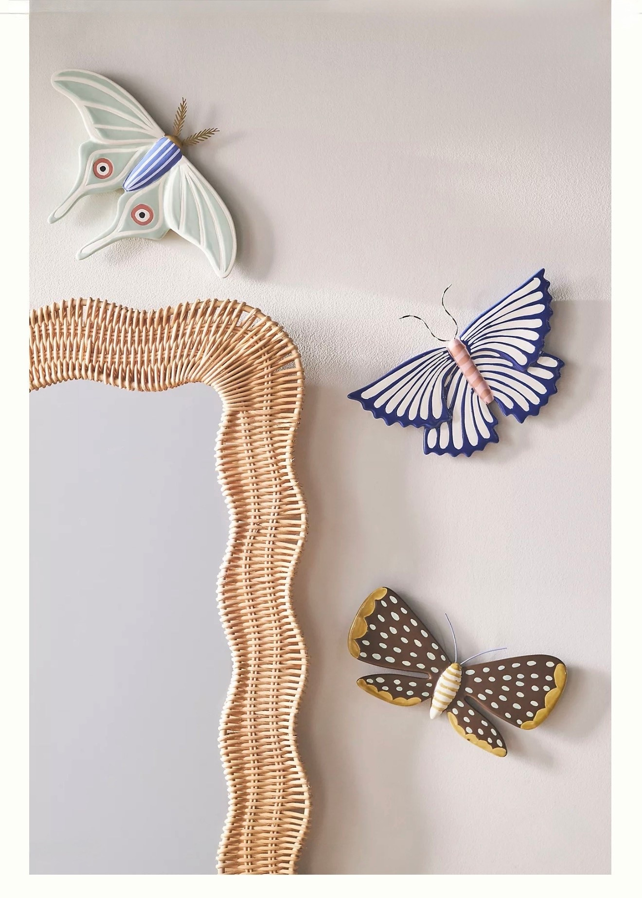 Sculpted Luna Moth Ceramic Wall Art Charm

This stunning Luna Moth ceramic piece features a painted metal antenna and intricate handpainted detailing on the wings & body. This art piece coordinates beautifully with the other spotted and striped moths for a playful yet elevated design on a gallery wall.

#LTKHome #LTKHoliday #LTKGiftGuide