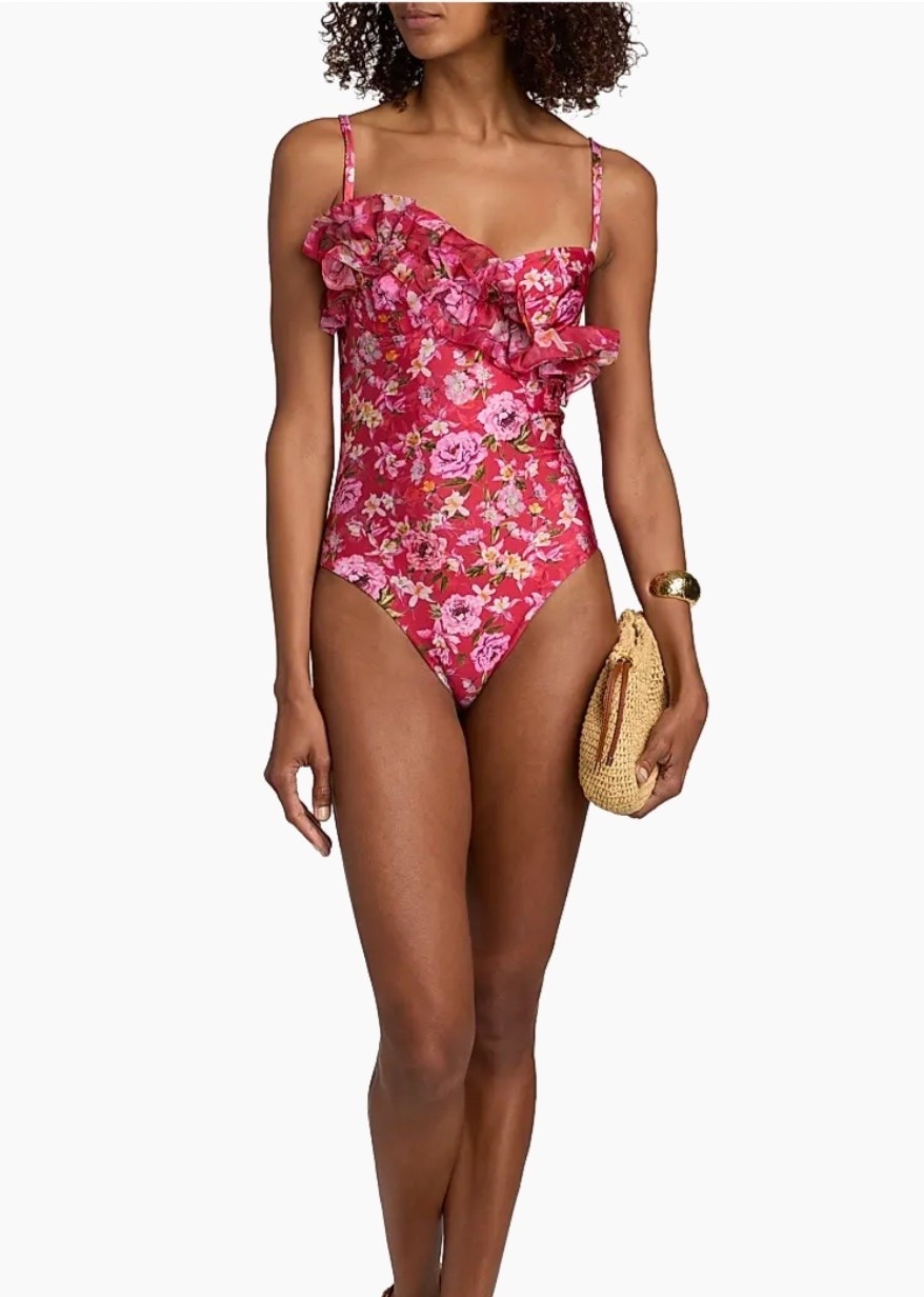 This swimsuit looks like it would be really flattering. The color is bright and fun and their ruching along the chest looks really fun.