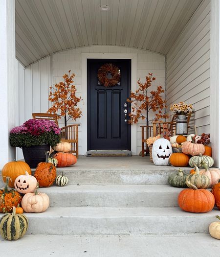 Cozy Fall-Halloween front porch decor! Some Lowes Jack o Lanterns, Amazon Fall trees pre lit, and porch furniture! 🍂

#LTKSeasonal #LTKhome #LTKHalloween