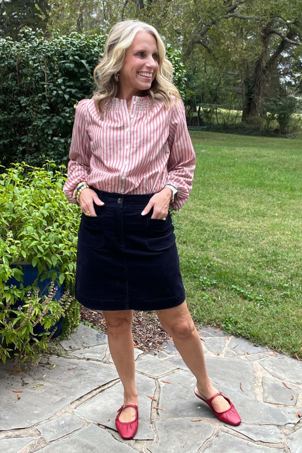 In LOVE with this corduroy skirt 
Wearing 4. Small top 
Blouse has the cutest smocking at the neck and will be a great layering piece as it gets colder. 
Add tights to the skirt and a ballet flat 
Or wear with sneakers 

#LTKOver40 #LTKWorkwear #LTKStyleTip