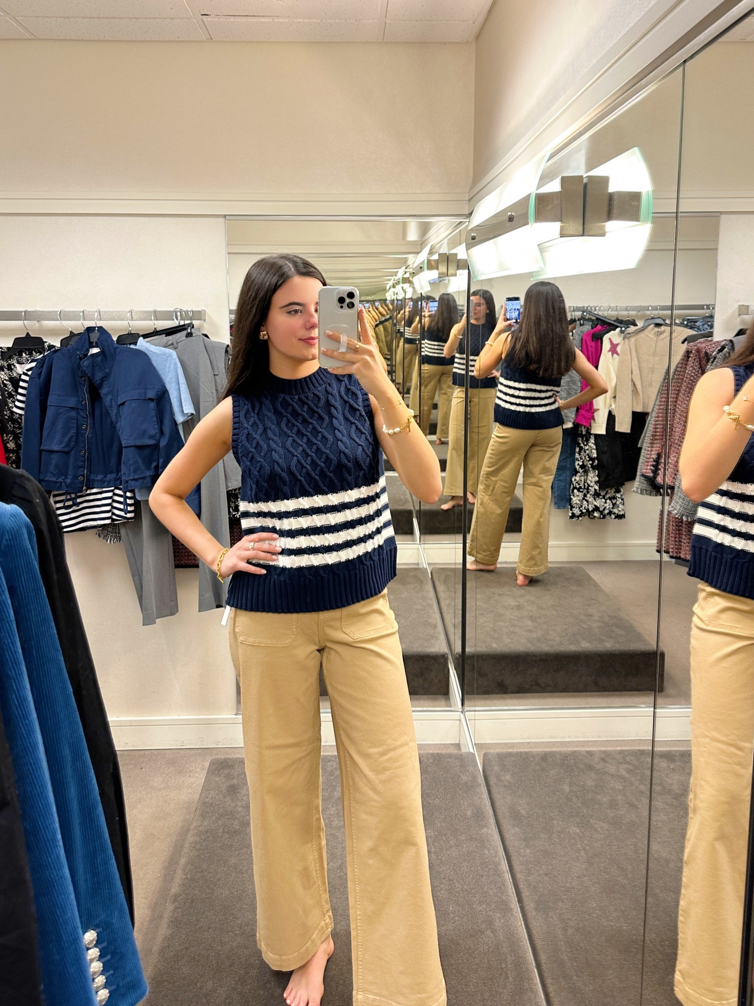 High waisted khaki pants and sleeveless navy and white sweater! Both pieces you can wear now 