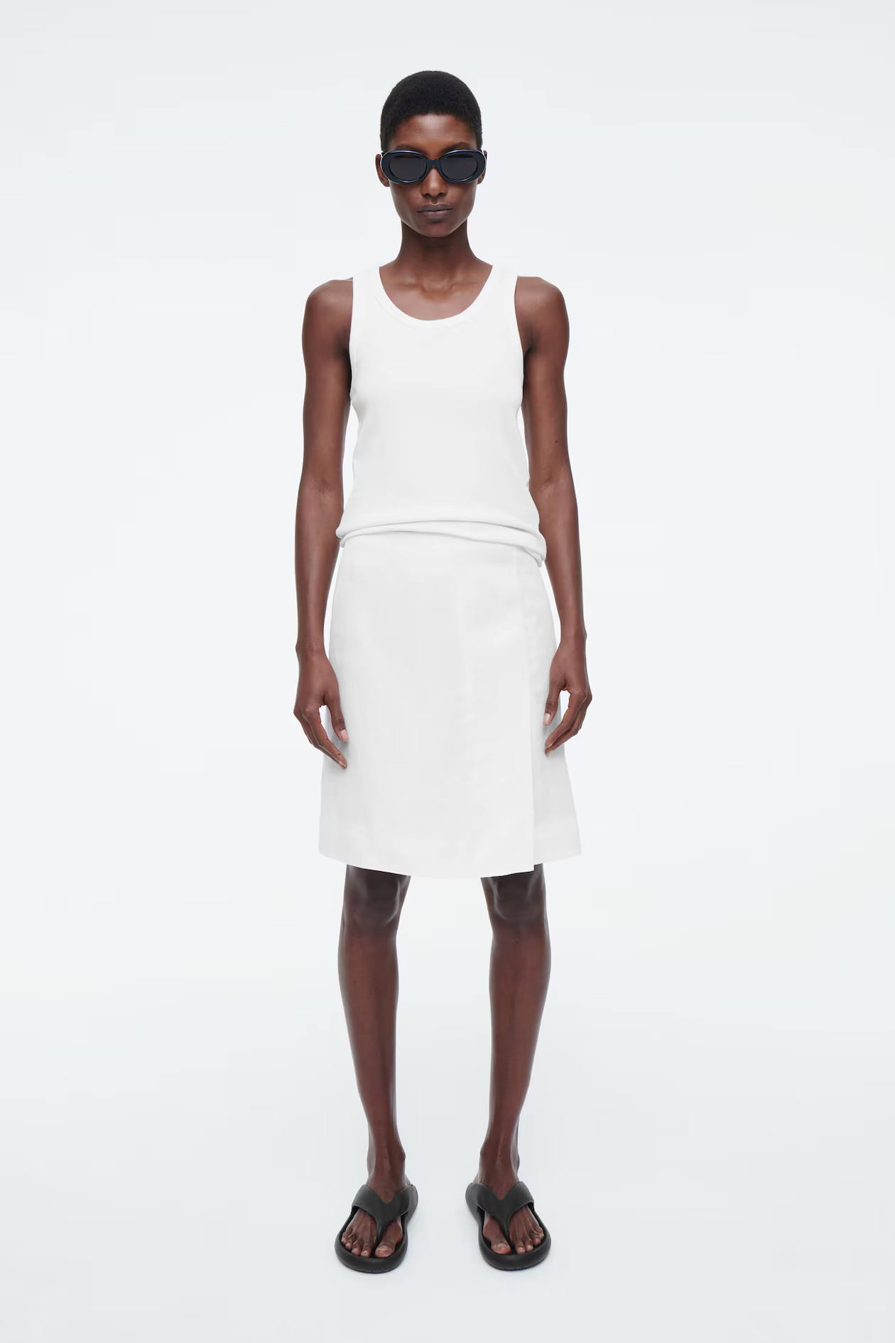 FRONT-PLEAT MINI SKIRT - WHITE | COS (AU)