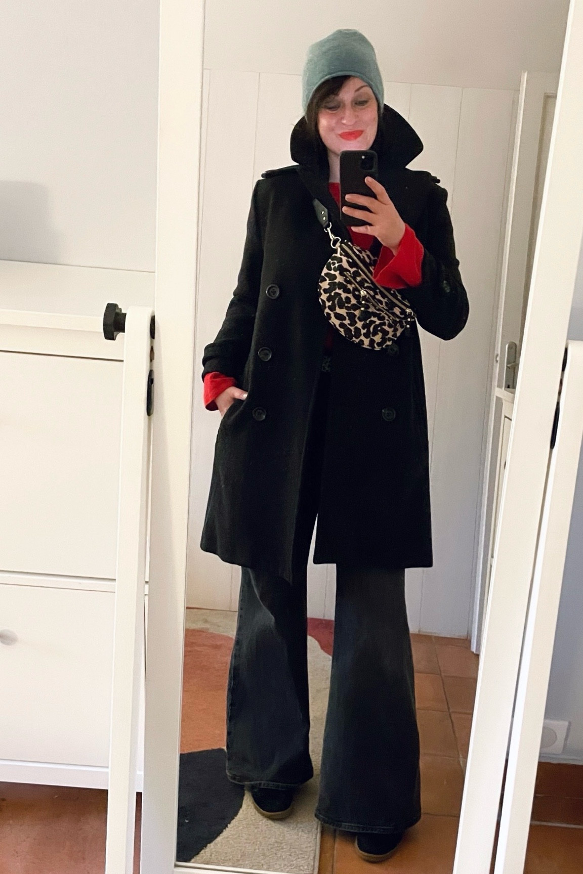 . Cashmere beanie #stylerepublic (similar, linked)
. Leopard fanny pack #petitemendigote (linked)
. Charcoal peacoat #emersonfry (similar, linked)
. Red 3D knit jumper #uniqlo (linked)
. Faded black flare jeans #levis (linked)
. "Feed the flame" matte lipstick #revlon (linked)
. Black suede sneakers #sandro 

#LTKwinter #LTKmidsize #LTKfrance