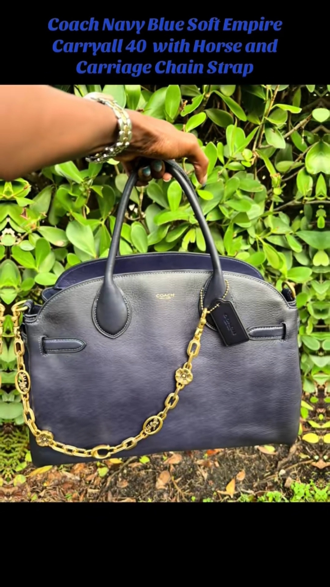 Coach Soft Empire 40 in navy blue — the definition of elevated everyday style. 💙 

The horse-and-carriage chain detail gives it that timeless Coach elegance, and the roomy, soft-structure design makes it perfect for work, travel, or days when you need a polished carry-all. 

A versatile statement bag that goes from commute to weekend with ease.

LTK-Appropriate Hashtags:
#LTKFinds #LTKStyle #LTKHandbags #LTKFashion
#CoachBag #CoachStyle #DesignerBags #WorkBagEdit
#TravelEssentials #BagLovers #ClassicStyle #WardrobeFavorites

#LTKOver40 #LTKTravel #LTKWorkwear