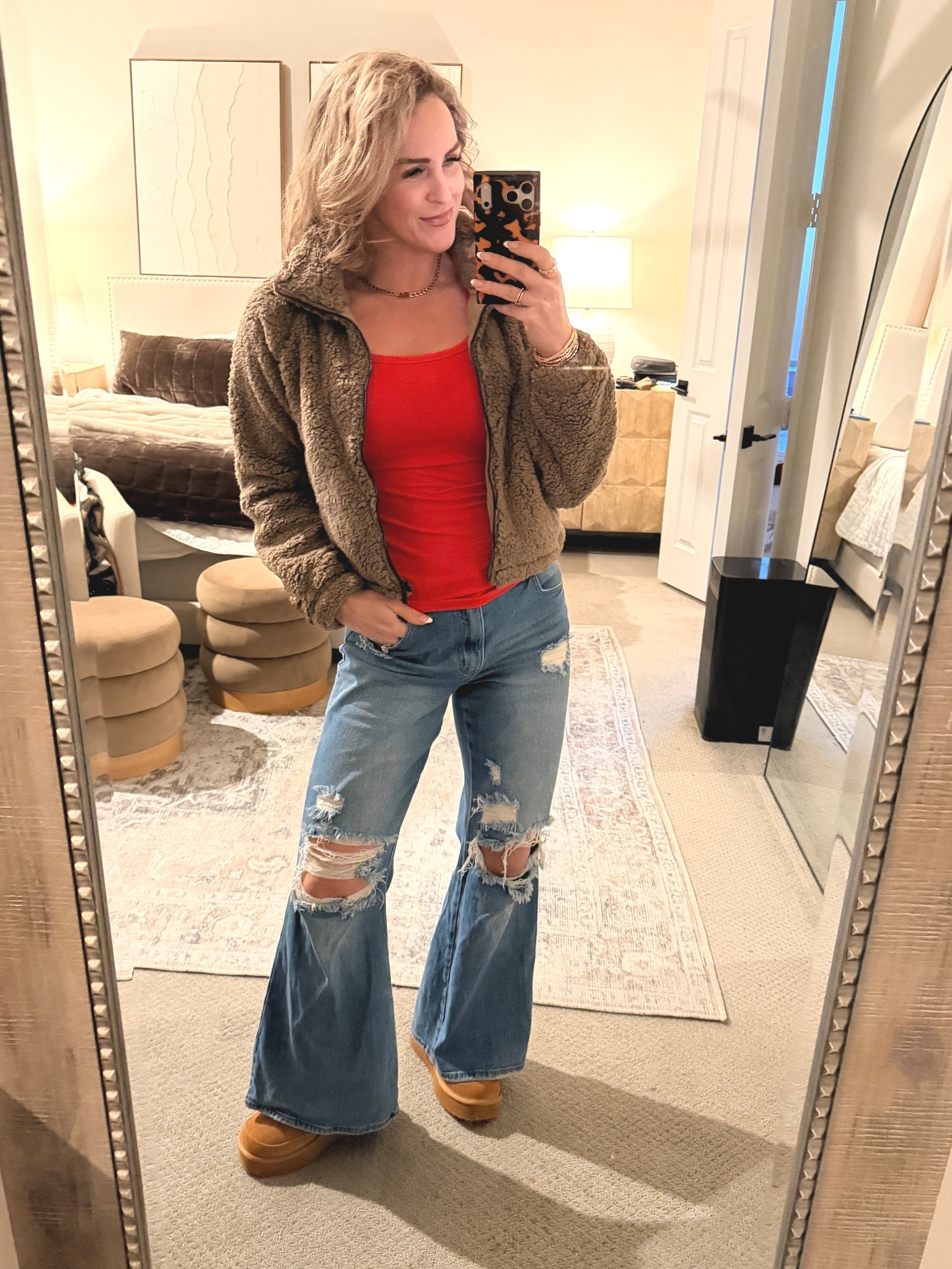 I’m so over his winter storm. Ready to get back in the swing of things. We did make it out of the house and to the gym today. Love these distressed flared denim and the ribbed long sleeve tee is so comfy! 

#LTKOver40 #LTKootd