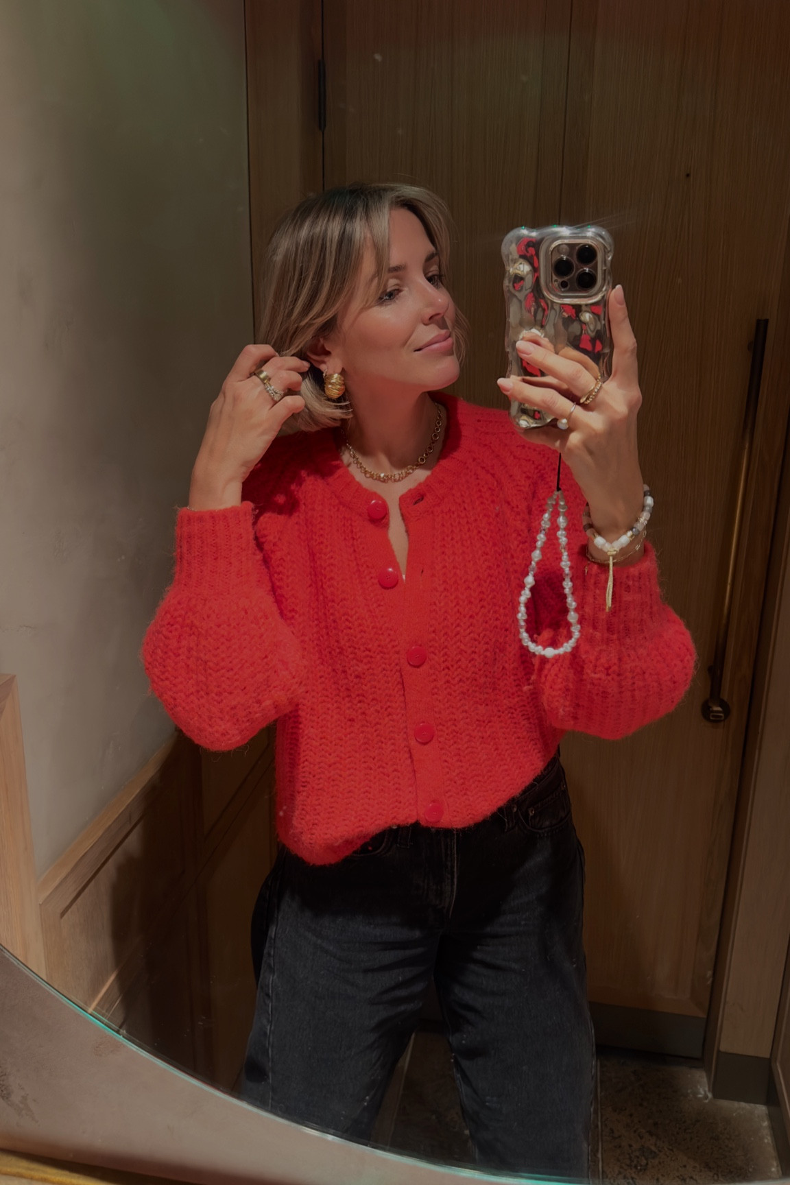 Valentines outfit 
Red cardigan 
Red jumper 
Barrel jeans 
Statement earrings 
Gold earrings 

#LTKuk #LTKeurope #LTKFashionMonth