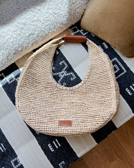 Oversized chic raffia tote! Fits a ton, keeps its shape because there’s a leather base and it’s still packable! 🤎 

#LTKSwim #LTKSeasonal #LTKItBag