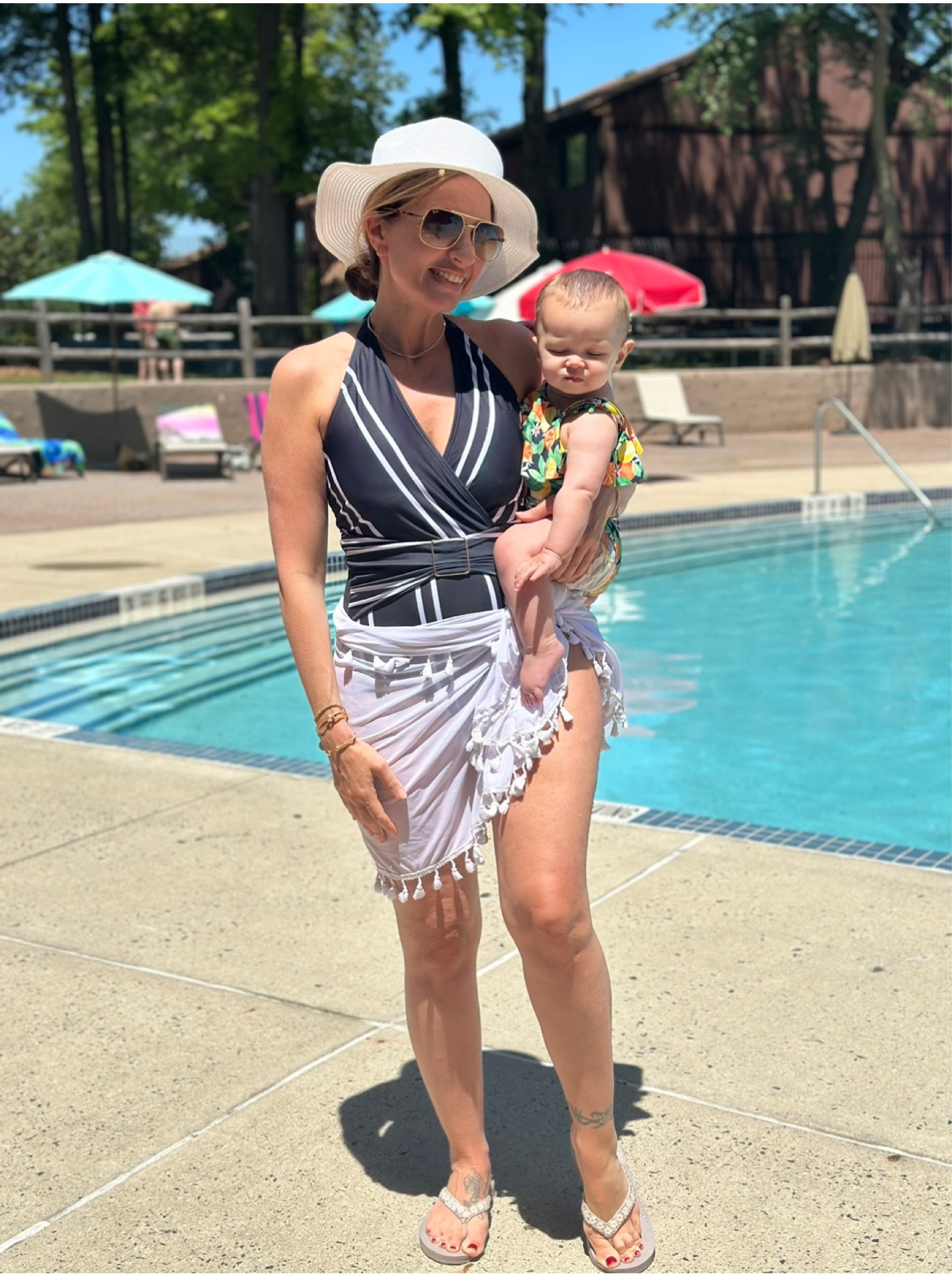 Our first pool day together! Isabelle was a huge fan of the water 💦 ❤️
I found this one piece bathing suit to be perfect for postpartum, as well as the cover up that you can make long or short. (Use code FAITHANDHAPPINESS25 at Pink Blush for a discount on it 💰)
~I’ve learned to wear the suit (even if you are not 100% comfortable in your body because you are beautiful & perfect ❤️) get in the pool mama, have fun 🤩 & forget the rest~ these days go fast & are worth remembering 💖

#LTKswim #LTKSeasonal #LTKunder50