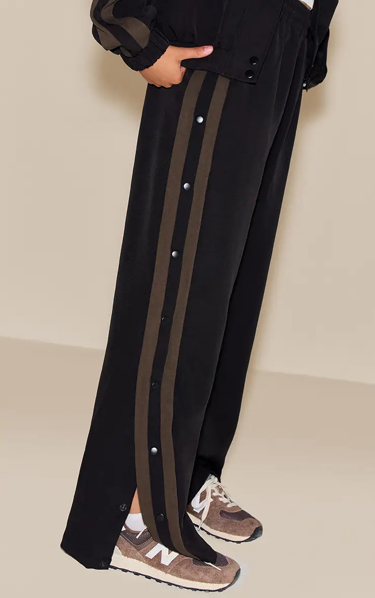 Joggers | Black Tricot Stripe Detail Popper Side Joggers | PrettyLittleThing | PrettyLittleThing UK