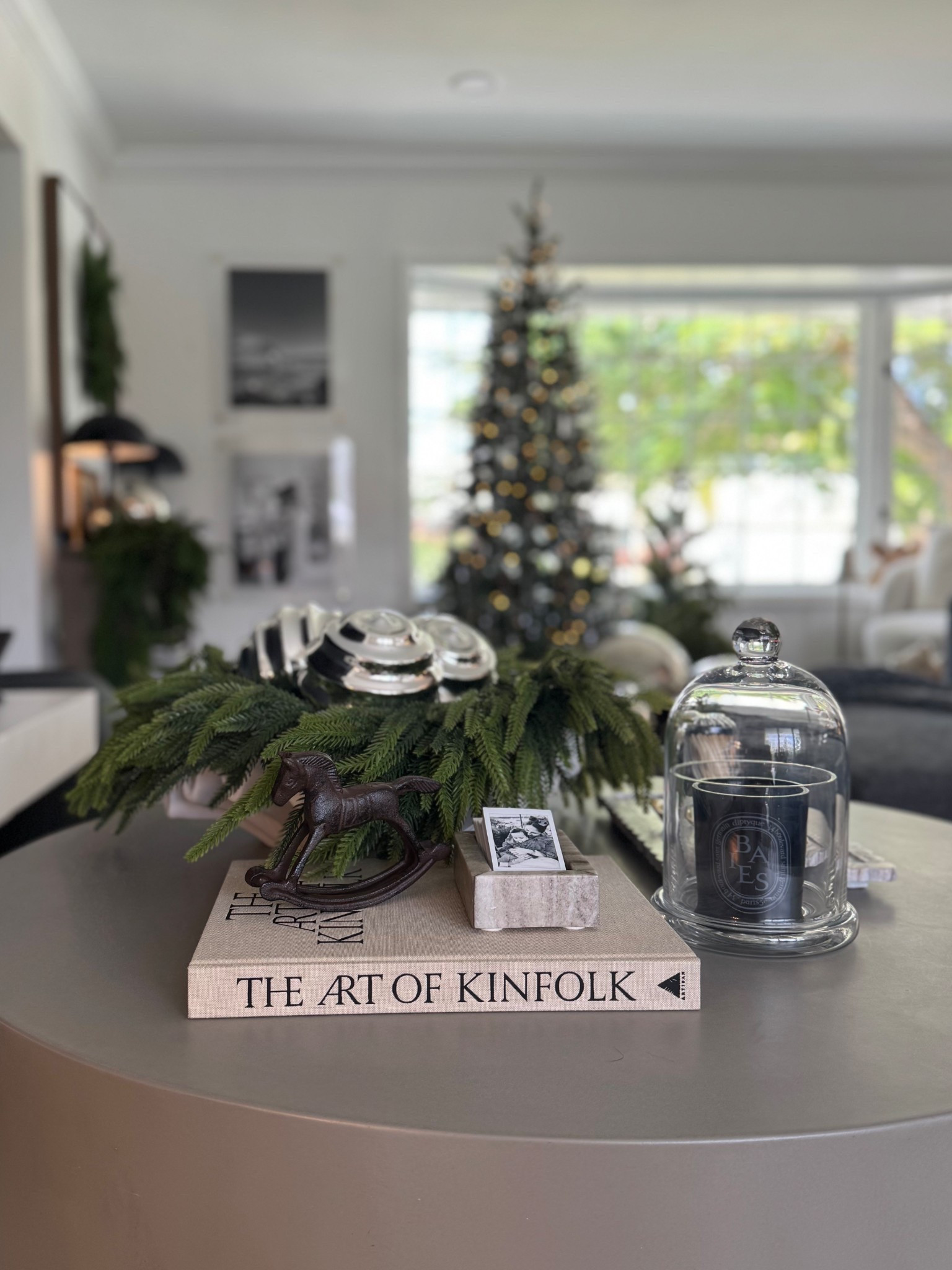 Coffee table styling / Christmas edition / greenery / silver accents / rocking horse / candles / coffee table books 

#RalphLaurenStyle #EquestrianChic #ClassicChristmas #RalphLaurenHome #ChristmasDecorInspo #HolidayHomeDecor #CozyLuxury #TraditionalChristmas #ChristmasAesthetic #ChristmasDecorIdeas

#LTKSeasonal #LTKHome #LTKHoliday