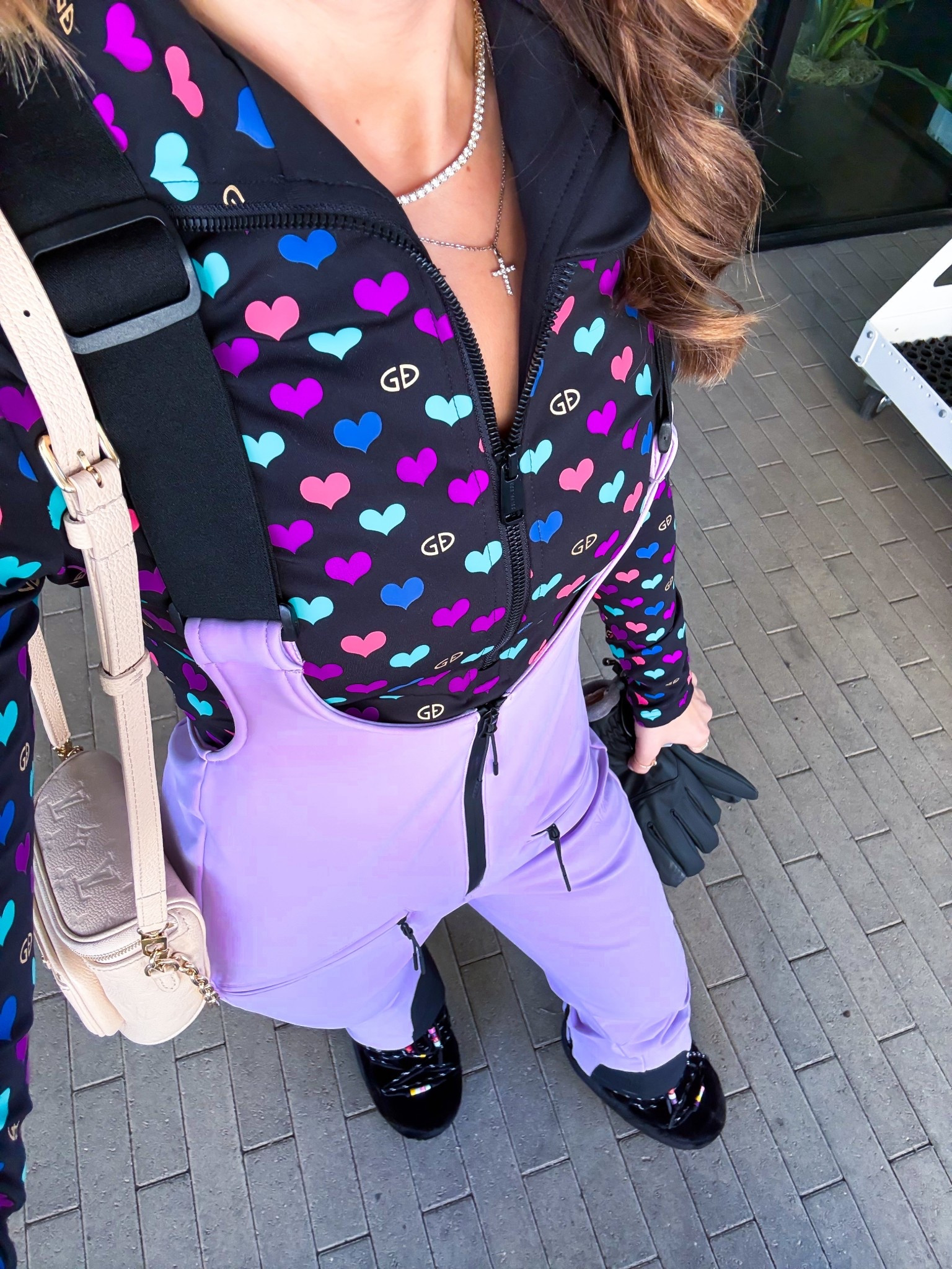Ski trip outfit. Park city outfit. My snow tubing outfit of the day! Amazon ski bib in XS in light purple. Goldberg heart ski top in XXS. Moon Boots are older style but linking similar. 

#LTKActive #LTKTravel #LTKootd