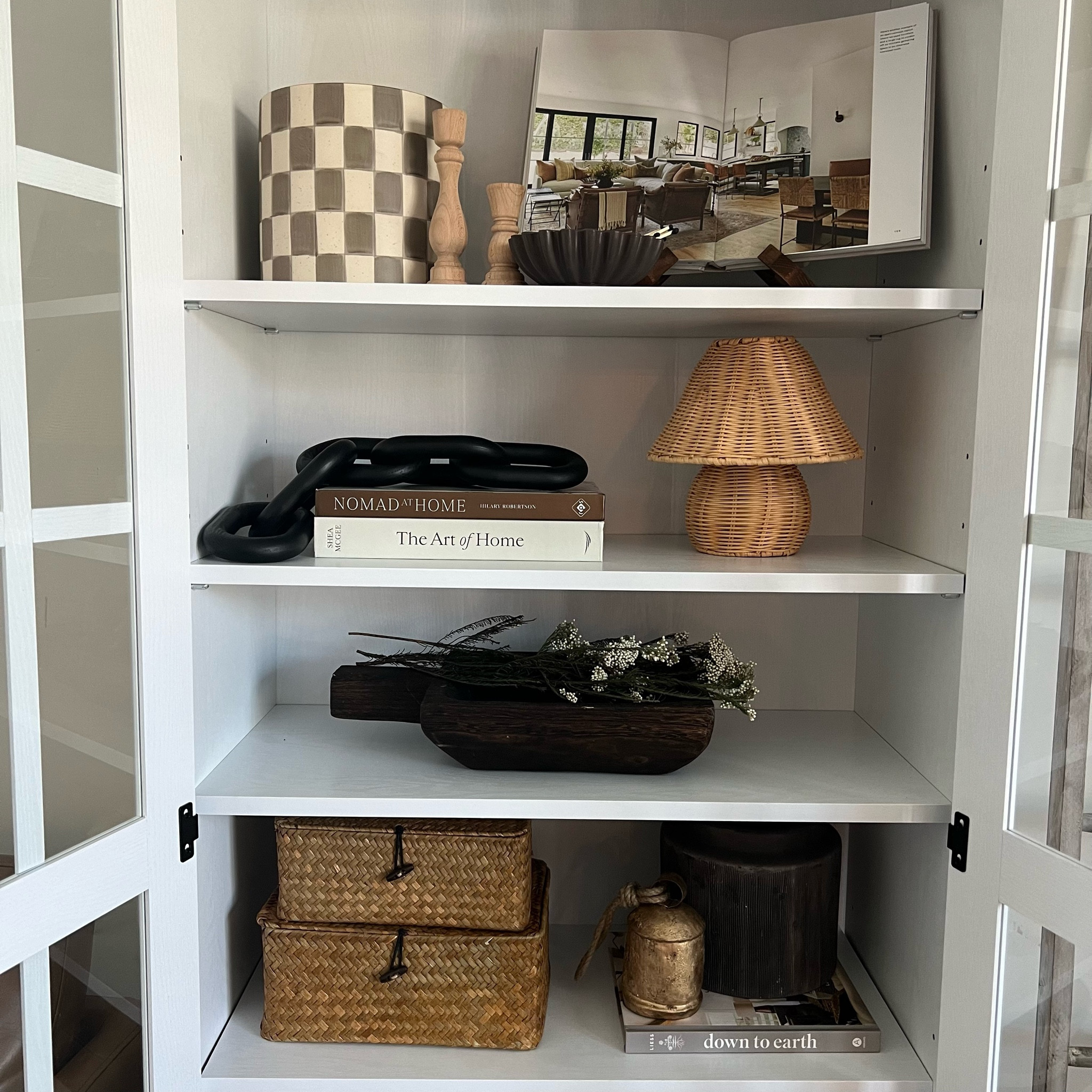 Affordable cabinet decor! 🤎
Bookshelf decor, earthy organic, neutral modern design, Temu home decor, shelf styling decor, affordable shelf decor, vintage gold bells, woven storage boxes

#LTKHome #LTKSaleAlert #LTKFindsUnder100