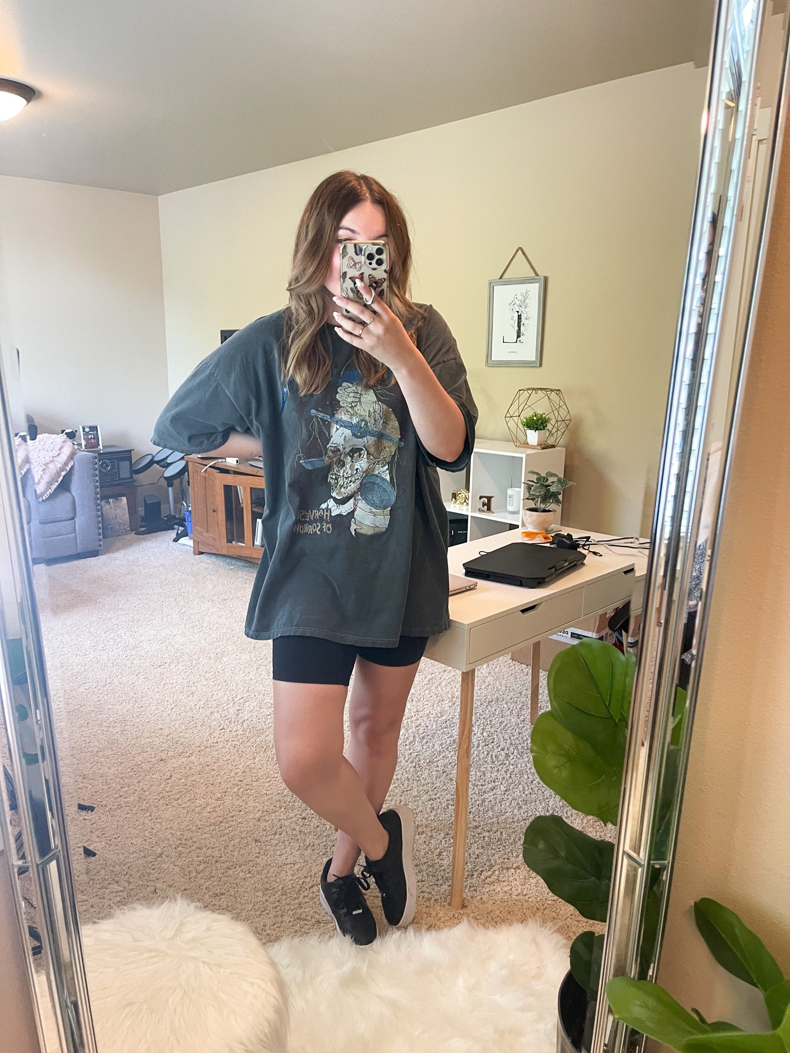Oversized band tee outfit from urban outfitters 

#LTKSale #LTKstyletip #LTKunder100