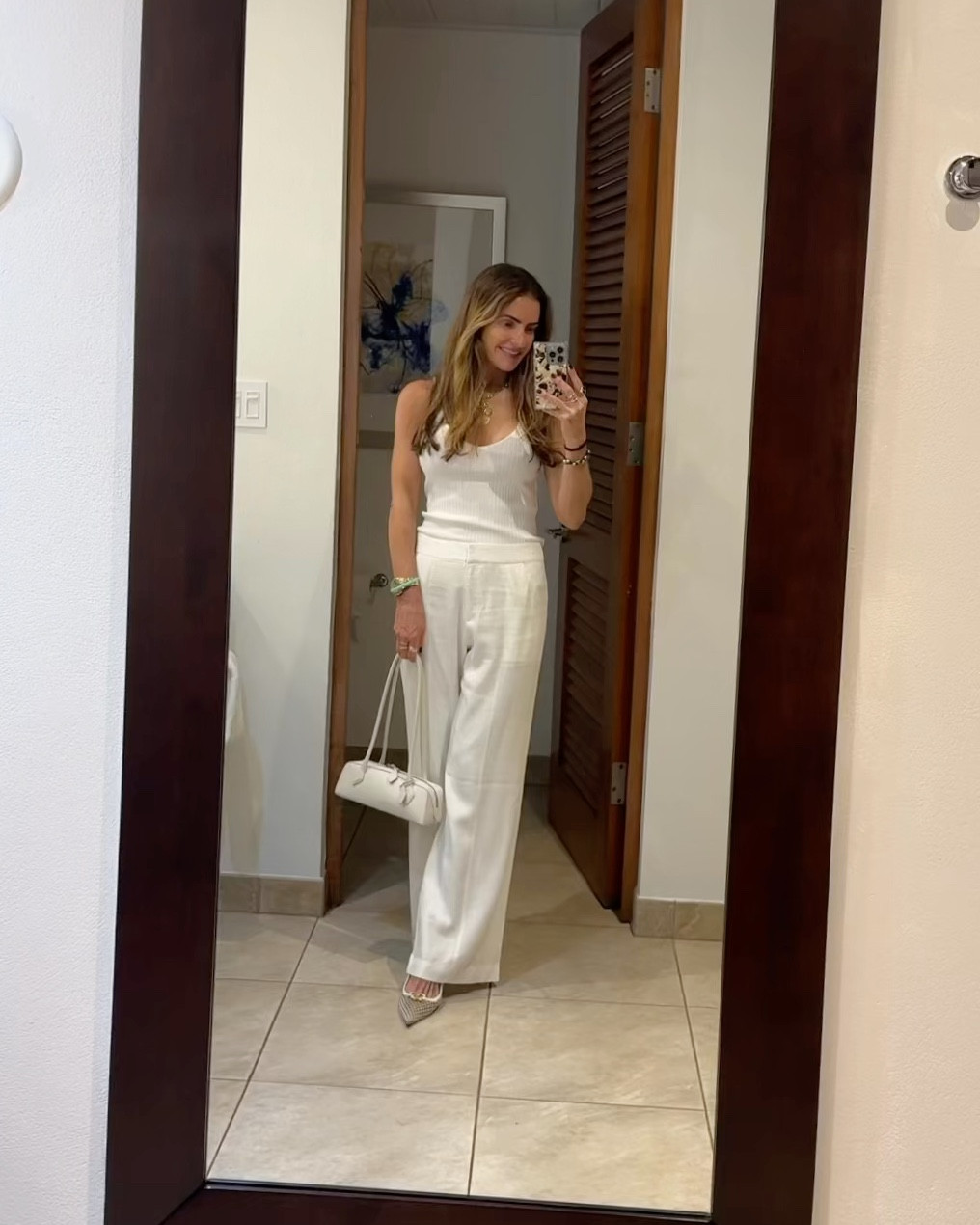 off to dinner at the pavilion here at @rosewoodlittledixbay ✨ wearing simple, yet chic monochromatic look🤍 

fav linen pants & shirts linked below & this gorgeous tank i have in 3 colors too! 

#LTKSaleAlert #LTKTravel #LTKWorkwear