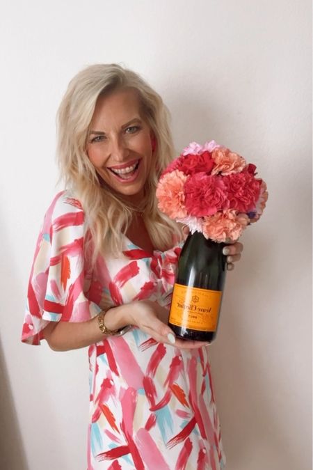 Mother’s Day Gifts // All mom’s want flowers and champagne! This cute pink summer dress is perfect for celebrating! 

Watch me make this arrangement on IG! 

Wearing a small 
Foam used to create arrangement linked too

#LTKover40 #LTKfindsunder100 #LTKhome