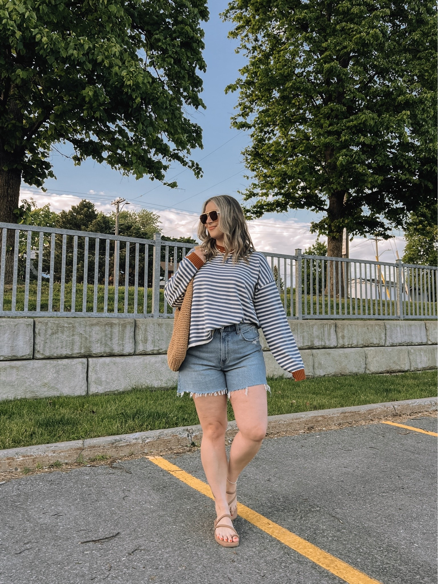 Comfy early summer outfit! Sized up to 32 in the denim shorts for a looser fit. Sweater is sold out from aerie, but linked the newer version of it (same stripe & fabric, just without cuffs). Crocs sandals are super comfy, I’m a 9.5-10 and wear a 10. Canadian Crocs link under “similar products”

#LTKsummer #LTKmidsize #LTKstyletip
