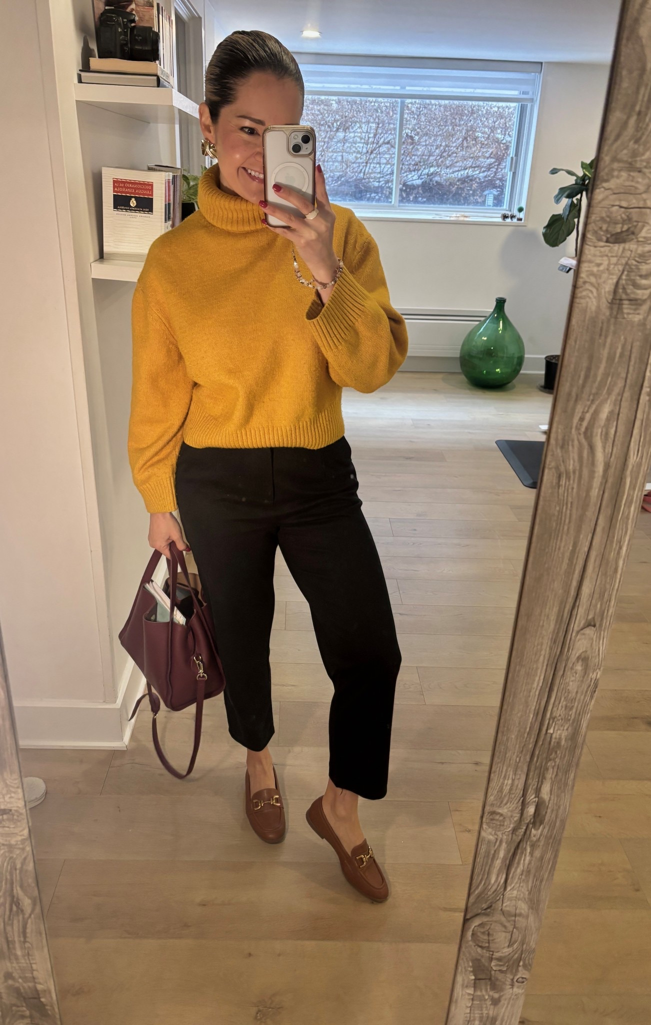 This chic fall outfit is perfect for work or a polished everyday look. Featuring a mustard turtleneck sweater paired with black ankle-length trousers, brown loafers, and a structured burgundy handbag, this outfit is effortlessly elegant and comfortable. Ideal for office wear, business casual days, or elevated casual style during fall and winter. Save this look for modern work outfit inspiration and timeless wardrobe ideas.

#LTKworkwear #LTKwinter #LTKcanada