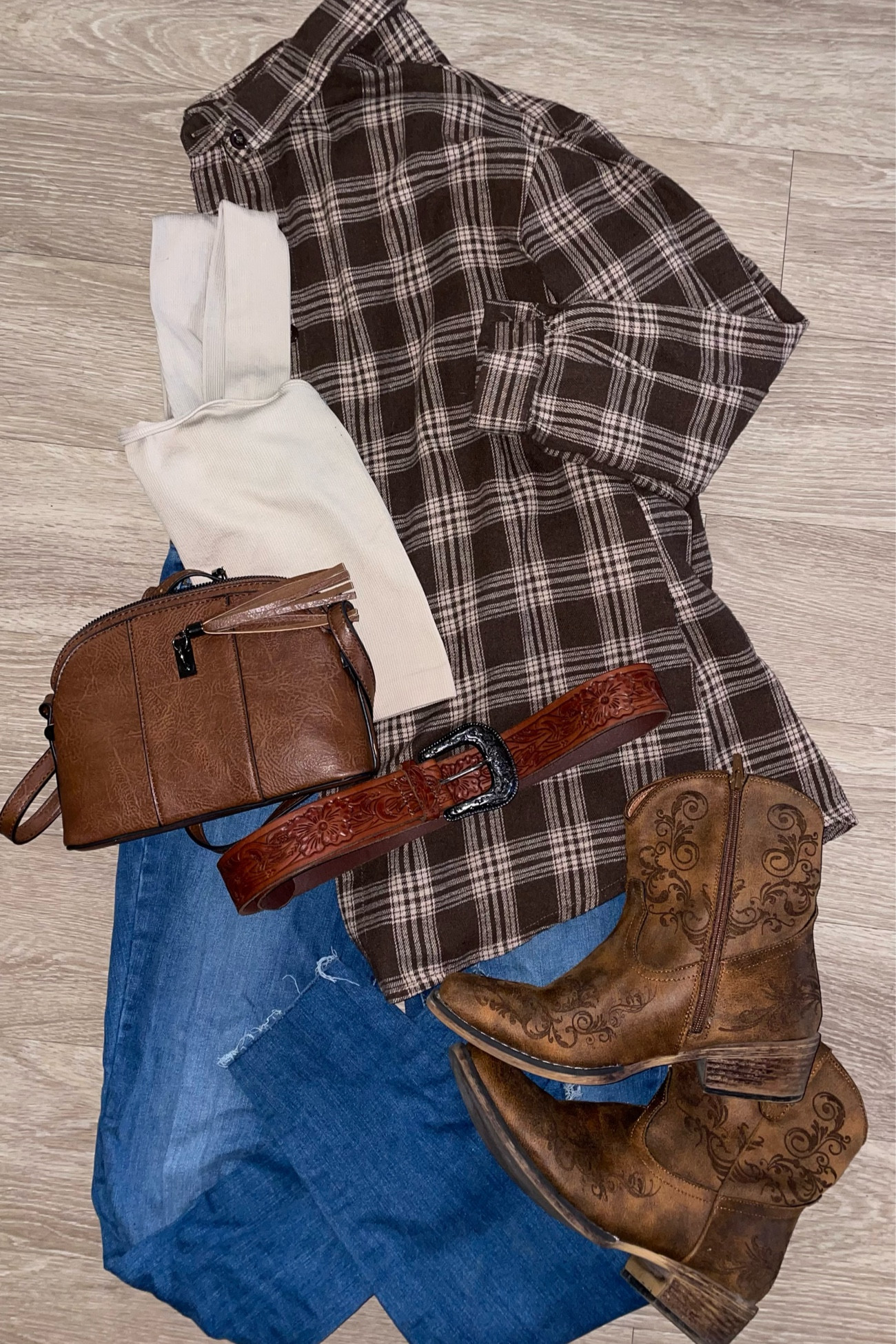 Fall Outfit - Fall outfit with a western flair featuring flannel, cowgirl boots, and jeans. 

#falloutfit #jeans #westernoutfit

#LTKSeasonal #LTKsalealert #LTKfindsunder50
