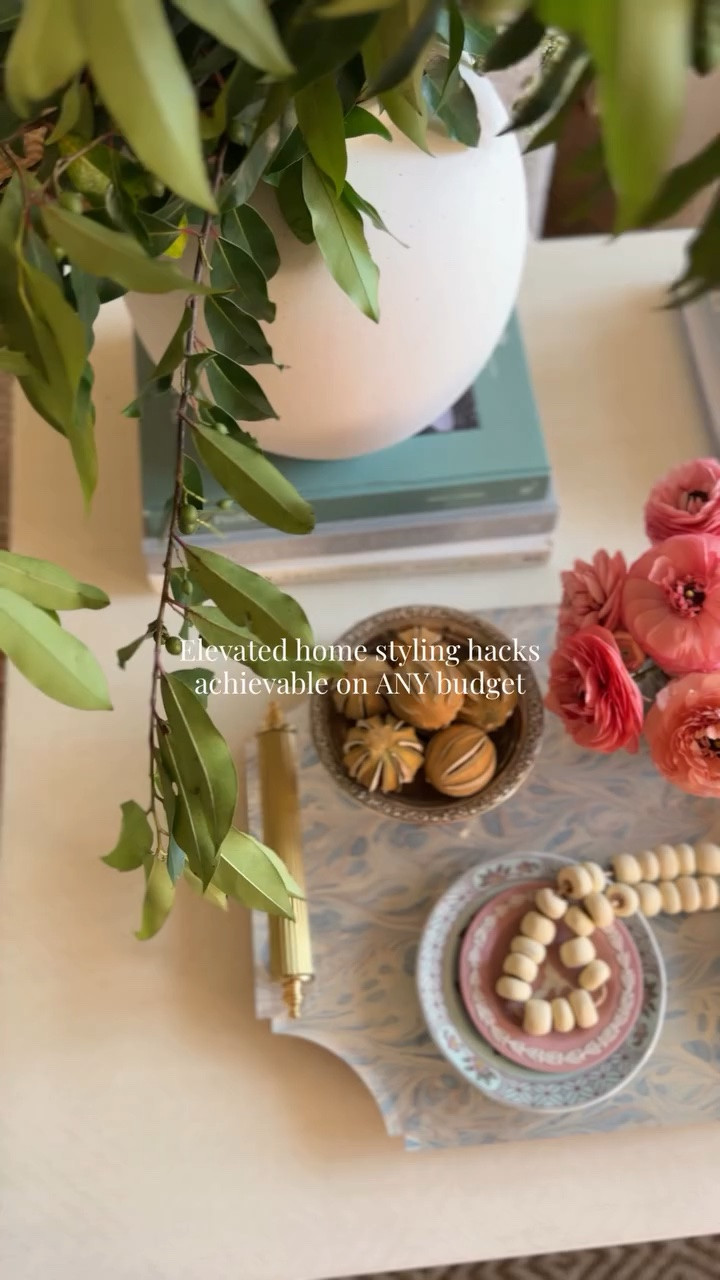 SOURCED: Stylist approved accessories for your home that won't break the bank!

I recently hired a professional prop stylist to help me on a brand shoot at my house and she brought in the layers and textures I was missing.

Here are the main holes I was missing in my styling:

Silver (antique vases, trinkets, bowls, etc)
Unique trays
Pots for plants
Pops of color (orange, pink, purple) 
achieved this with fresh fruit and florals
Levels - adding things on top of coffee book stacks and on table - bud vases are a MUST have

I've rounded up 50 Amazon items that will elevate your home without breaking the bank.