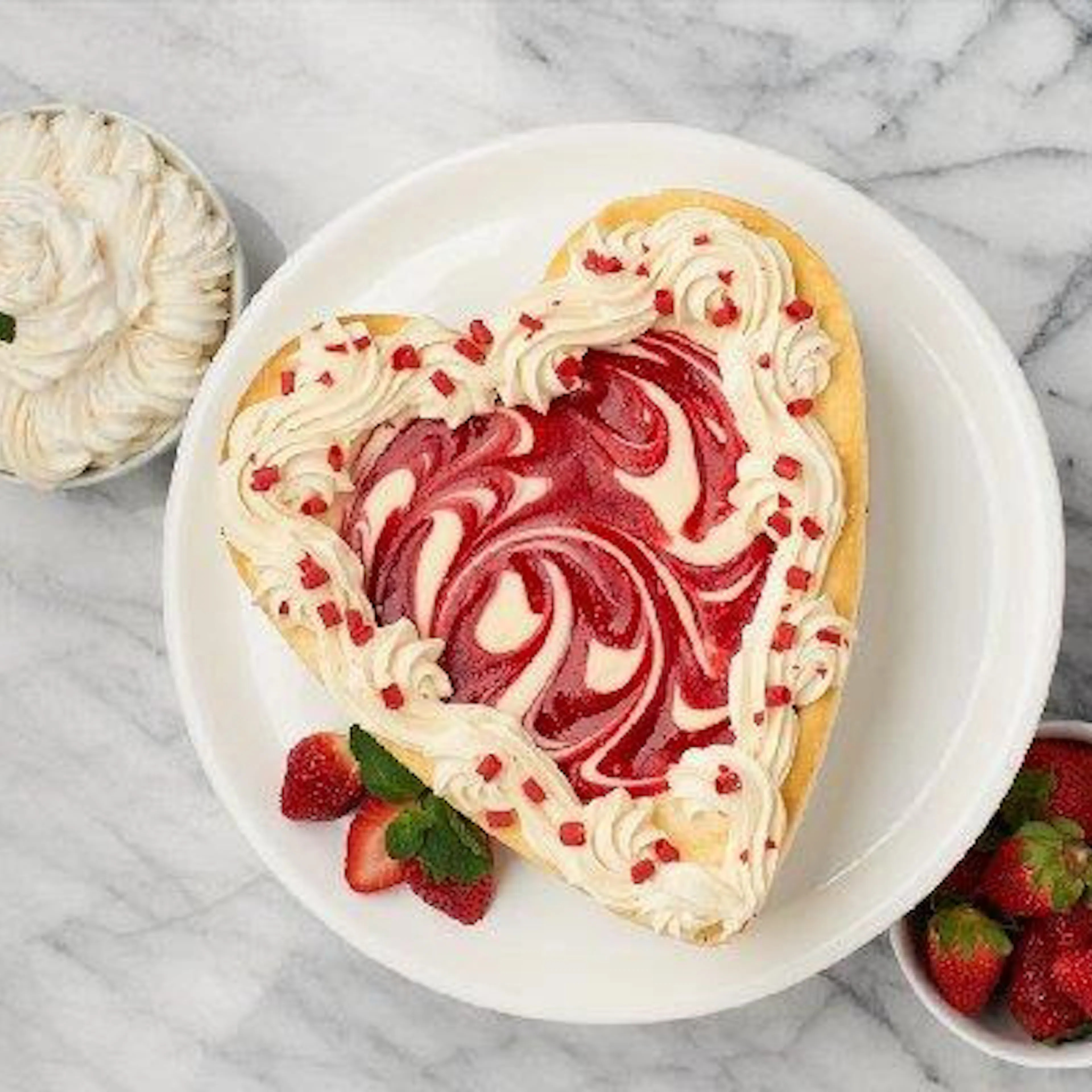 White Chocolate Strawberry Heart Cheesecake by Junior's Cheesecake | Goldbelly | Goldbelly