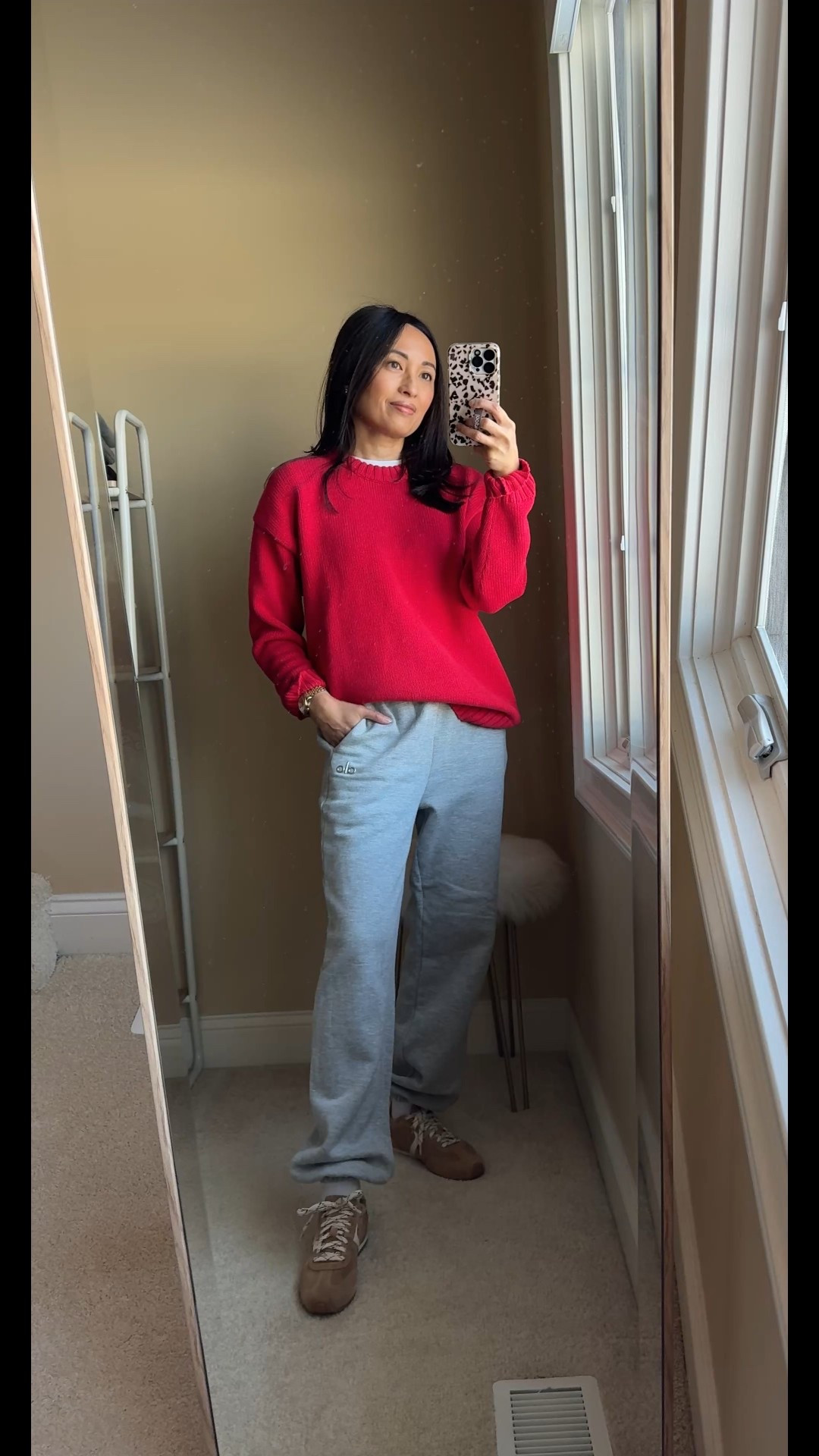 Winter outfit. 
Re-styling my everyday winter uniform. 
- Sweat sets are my go-to when the cold gets even colder. 
- To change it up, swap your sweatshirt out for a comfy sweater, with a white t-shirt peeling out. A pop of color changes everything too. 
- Switch out your everyday athletic shoes for more fashion sneakers in a different color. 
- Trading your trusty long black puffer for a wool coat may feel like a stretch, but instantly elevates basic sweats. 
- Add a last bit of interest with a non-athleisure feeling bag and a bag charm. 


#LTKootd #LTKOver40